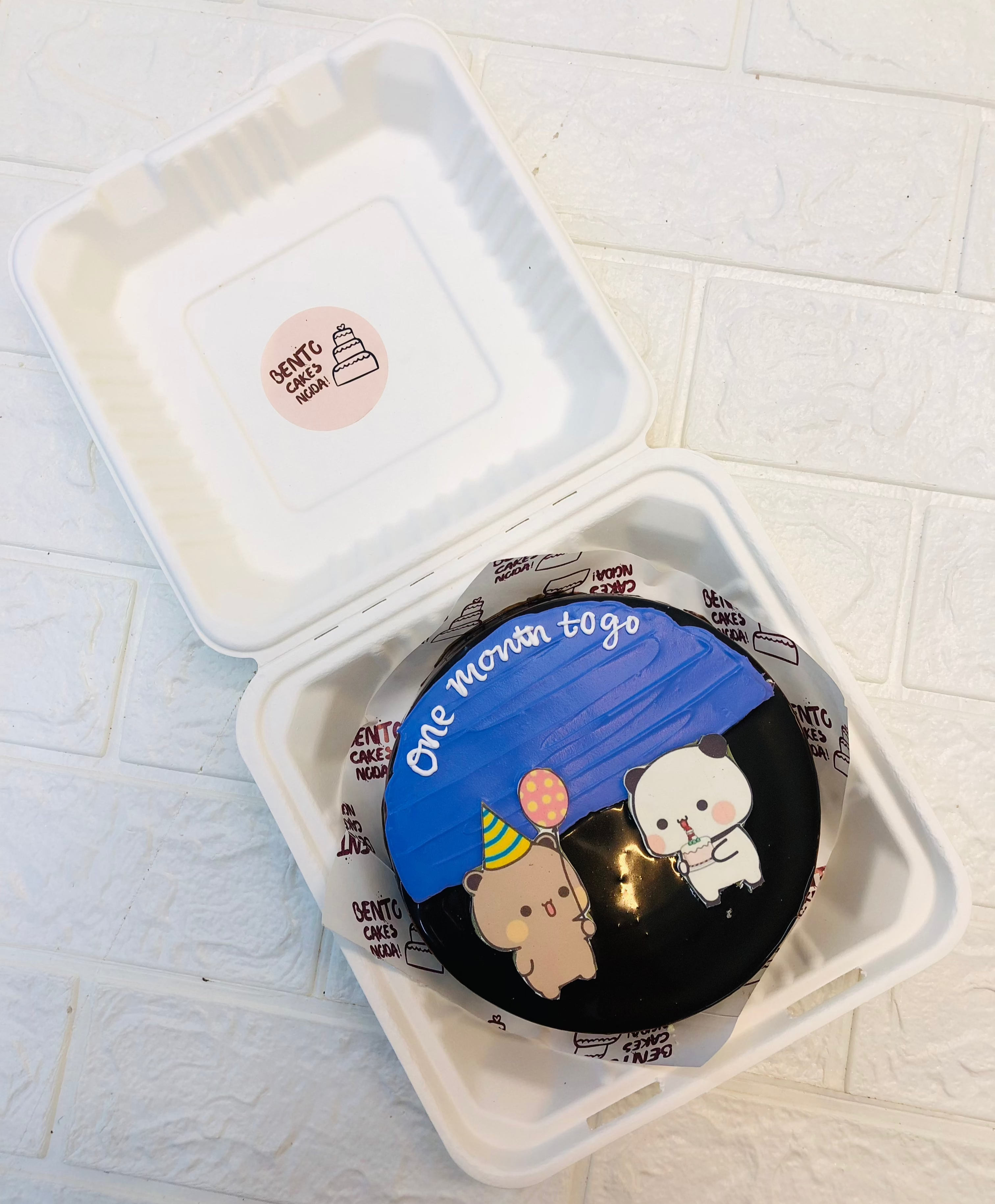 A dual color cute bubu dudu birthday celebration bento cake.