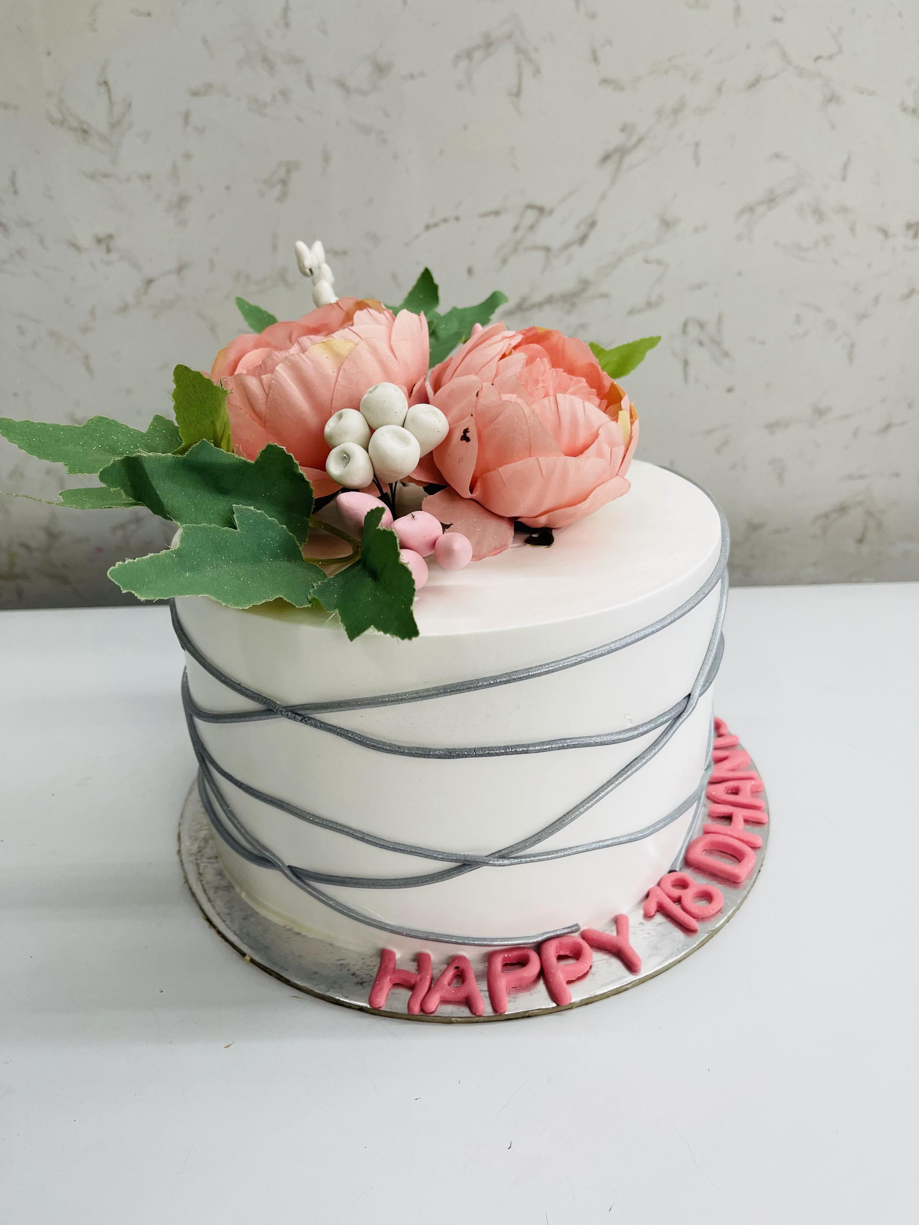 White Cake with Light Orange Flowers