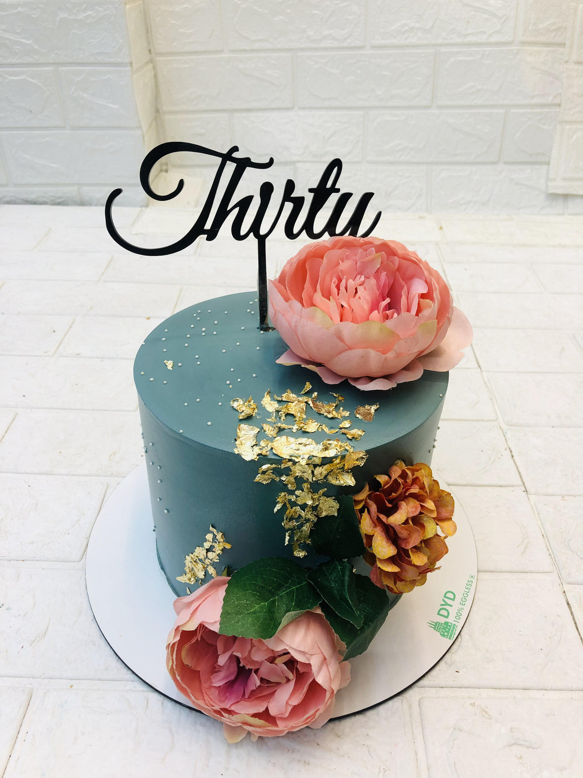 Blue Cake with Pink Orange Flowers