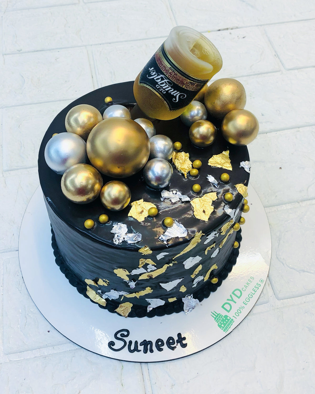Black Cake With Alcohol Bottle 1