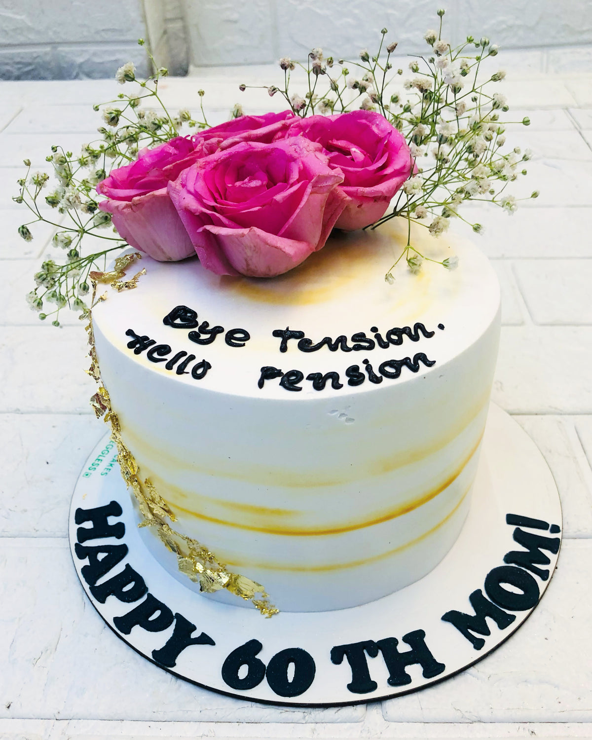 White Cake with Pink Flowers