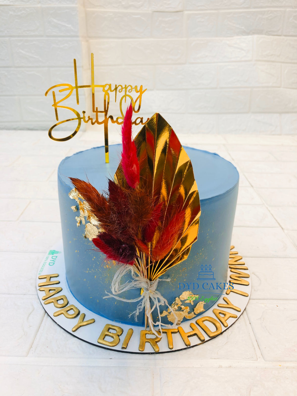 Gold Leaf Feather Blue Cake