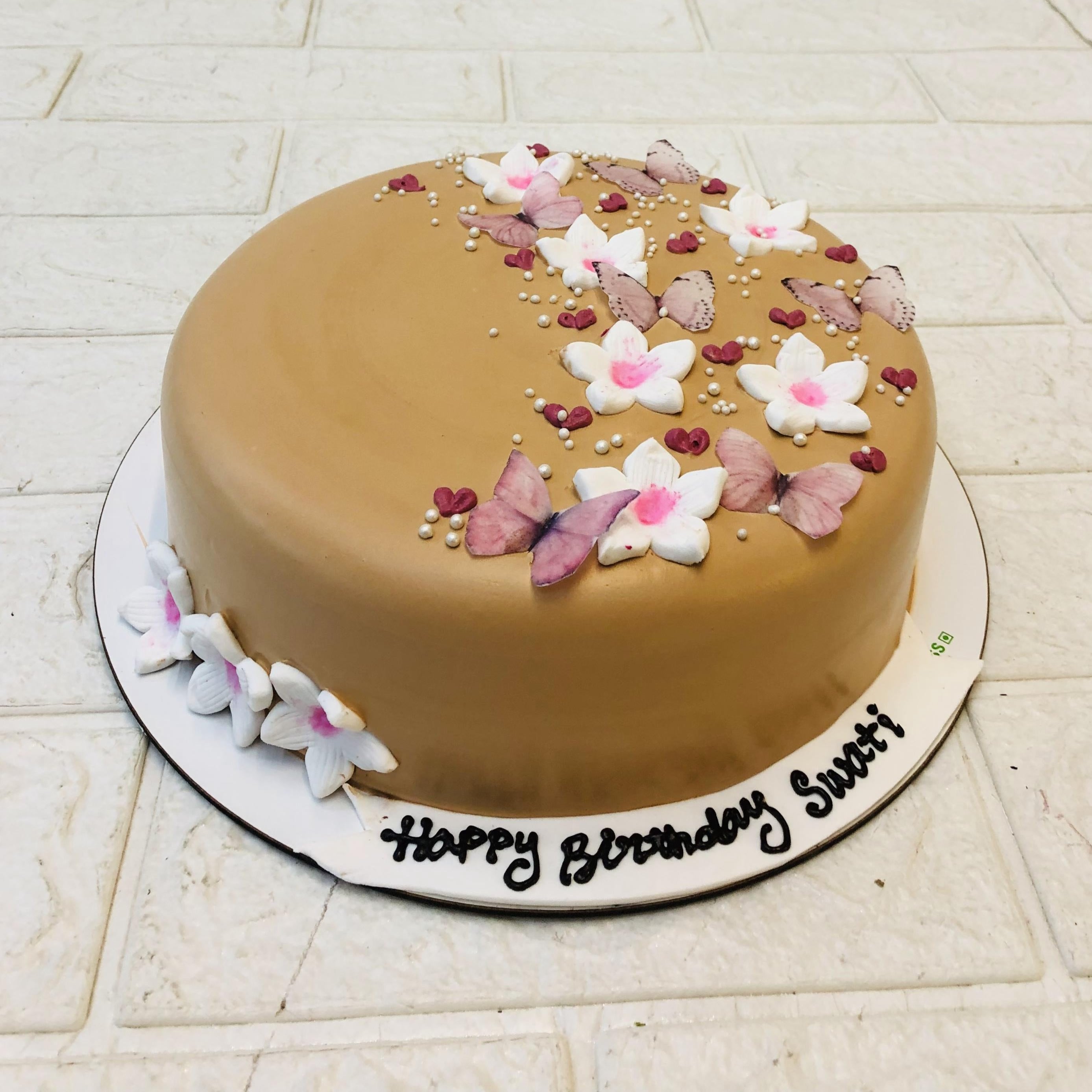White Flower In Brown Cake