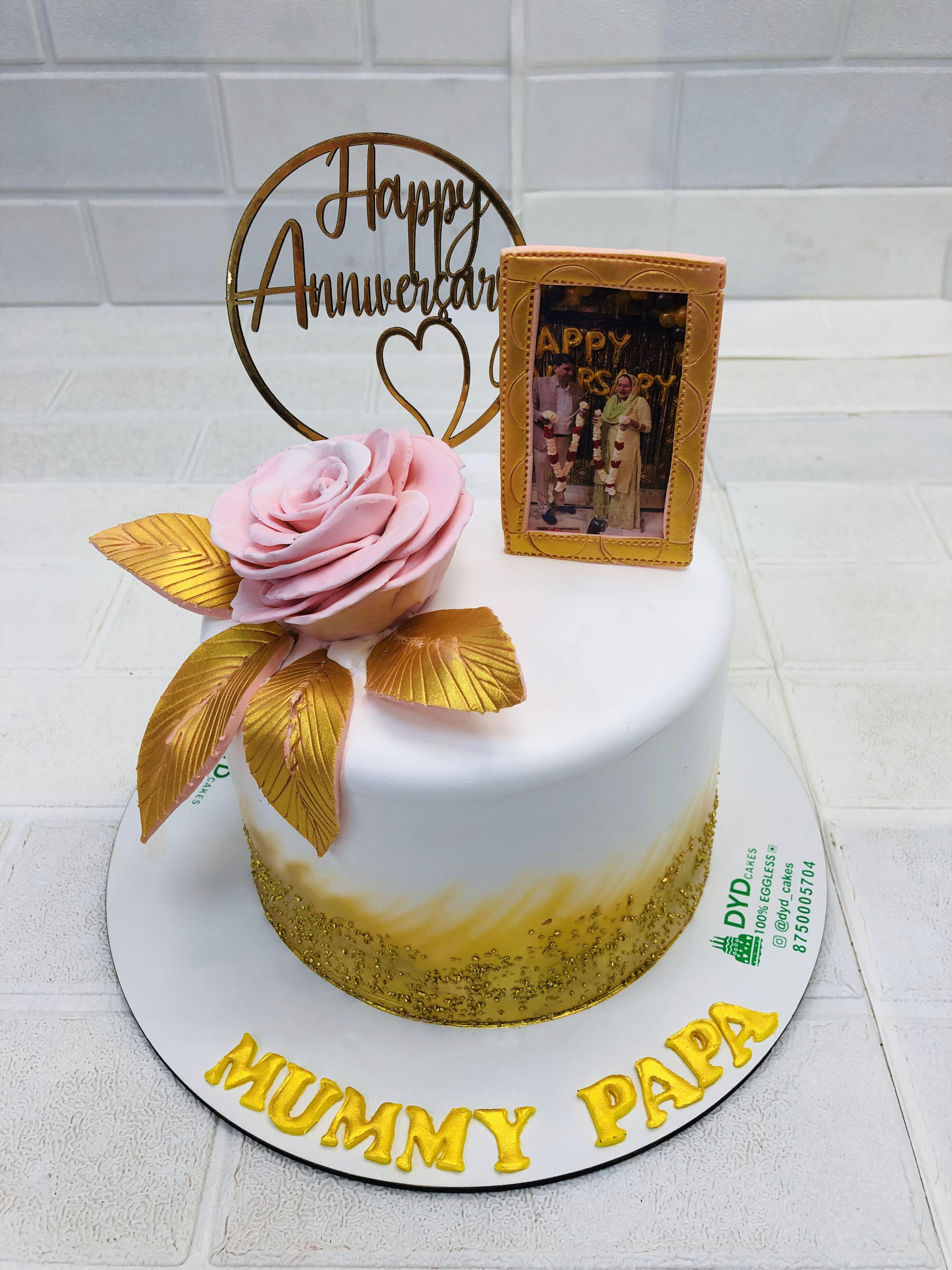 Pink Rose With Gold Pallets Cake