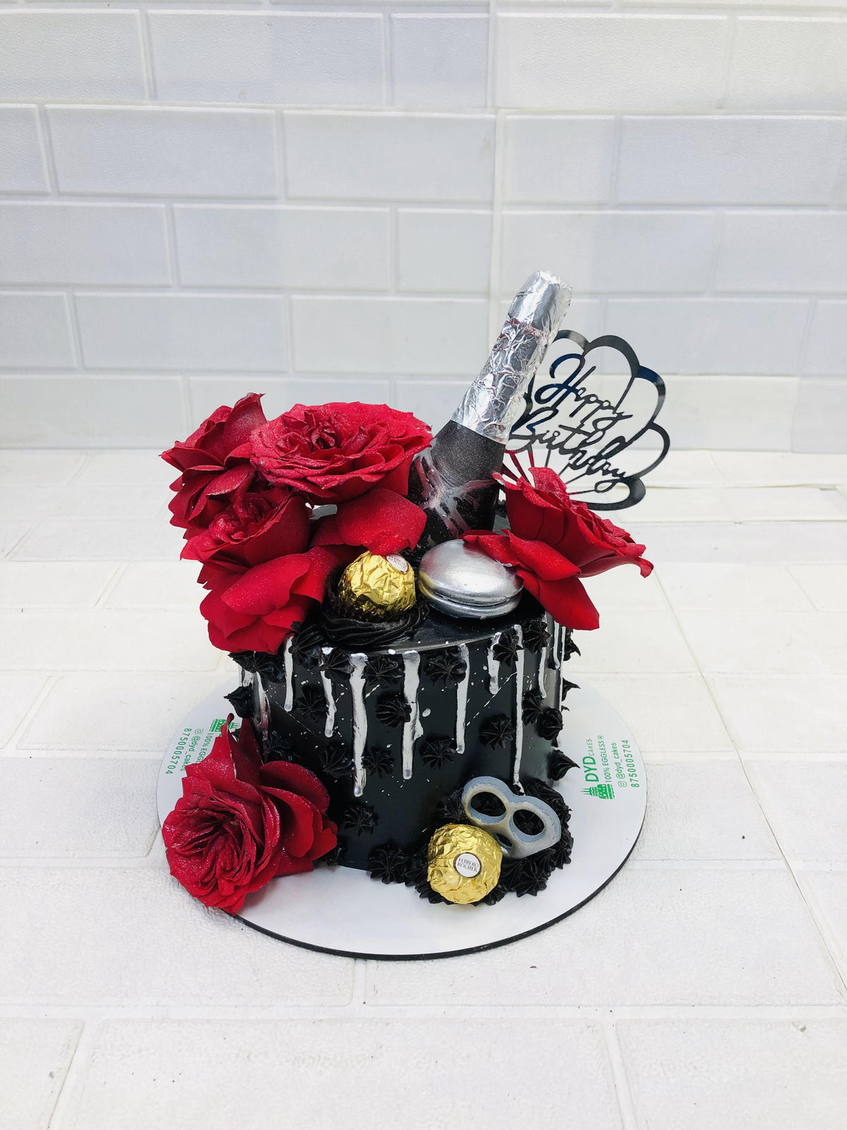 Dark Black Cake With Roses and Bear