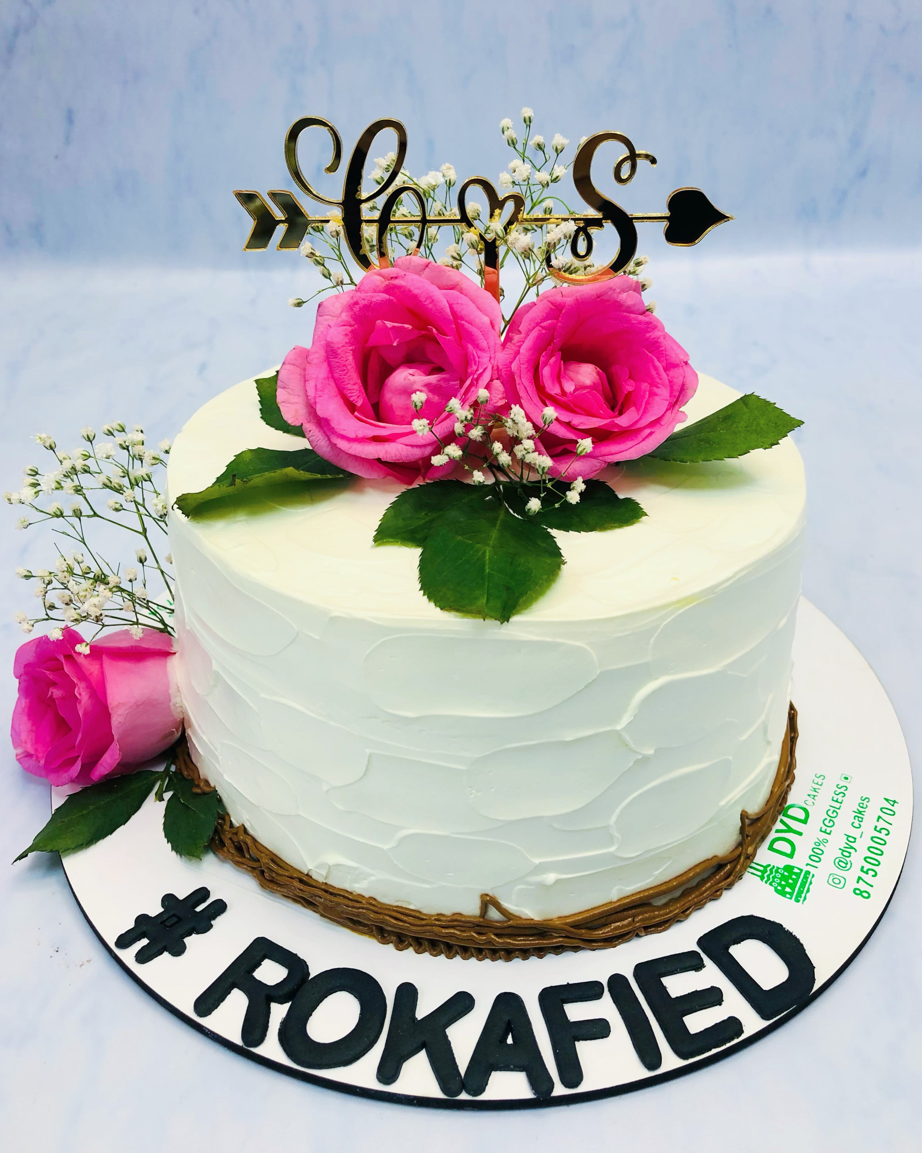 Elegant White Cake With Fresh Roses
