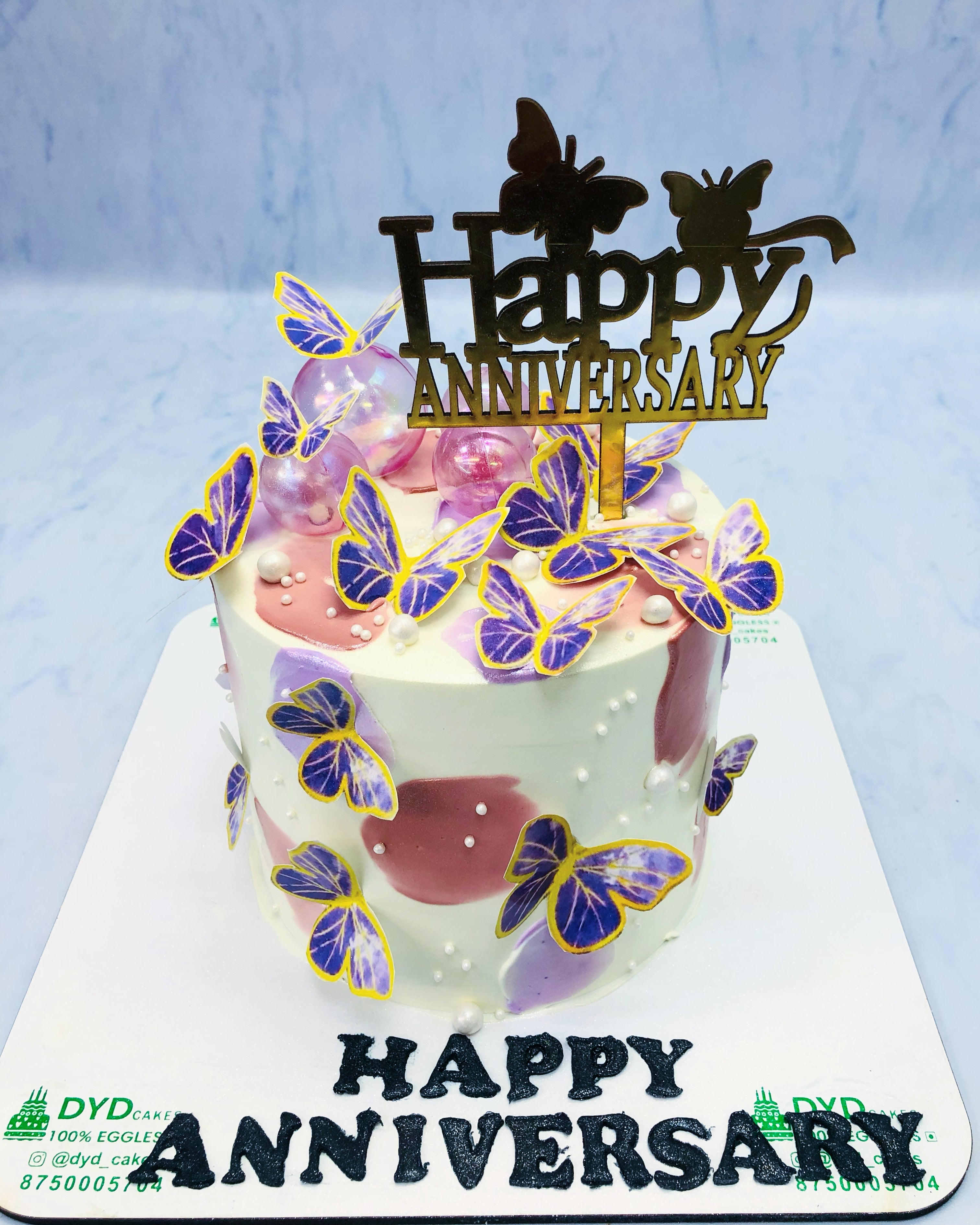 Anniversary Cake With Butterflies And Balloons