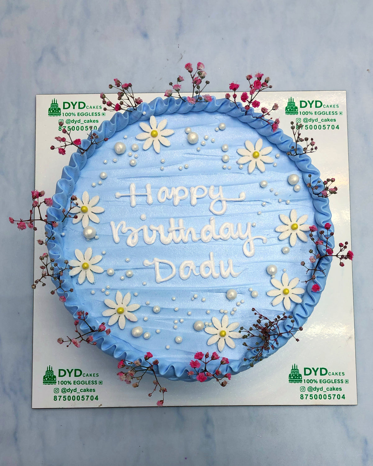 Beautiful Flowers on Blue Cake