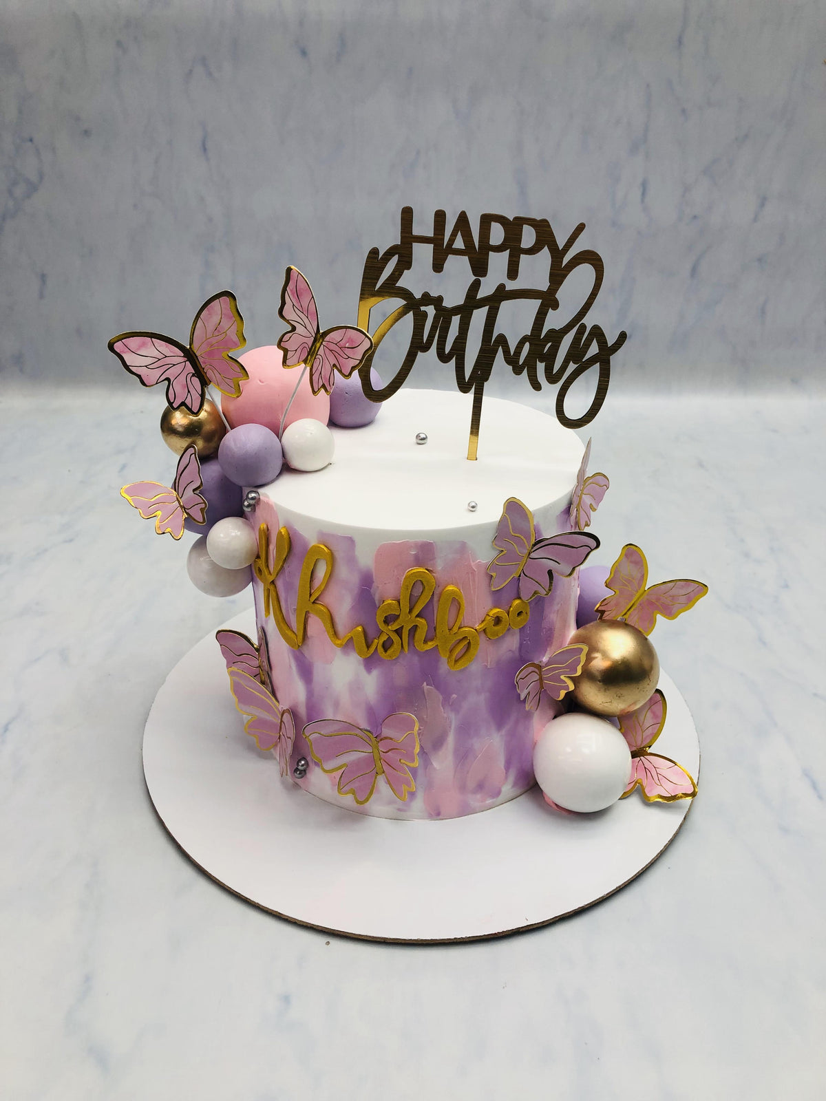 Aesthetic Cake with Golden Balls and Butterflies
