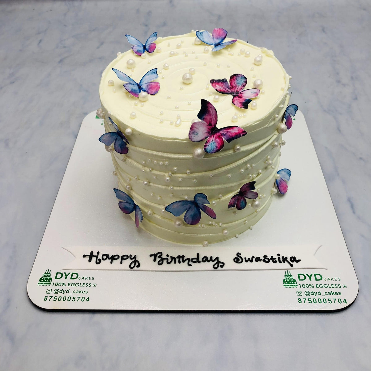 Peach Color Cake With Butterflies