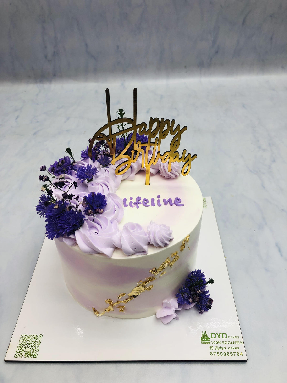 Beautiful Blue Flowers on White Cake