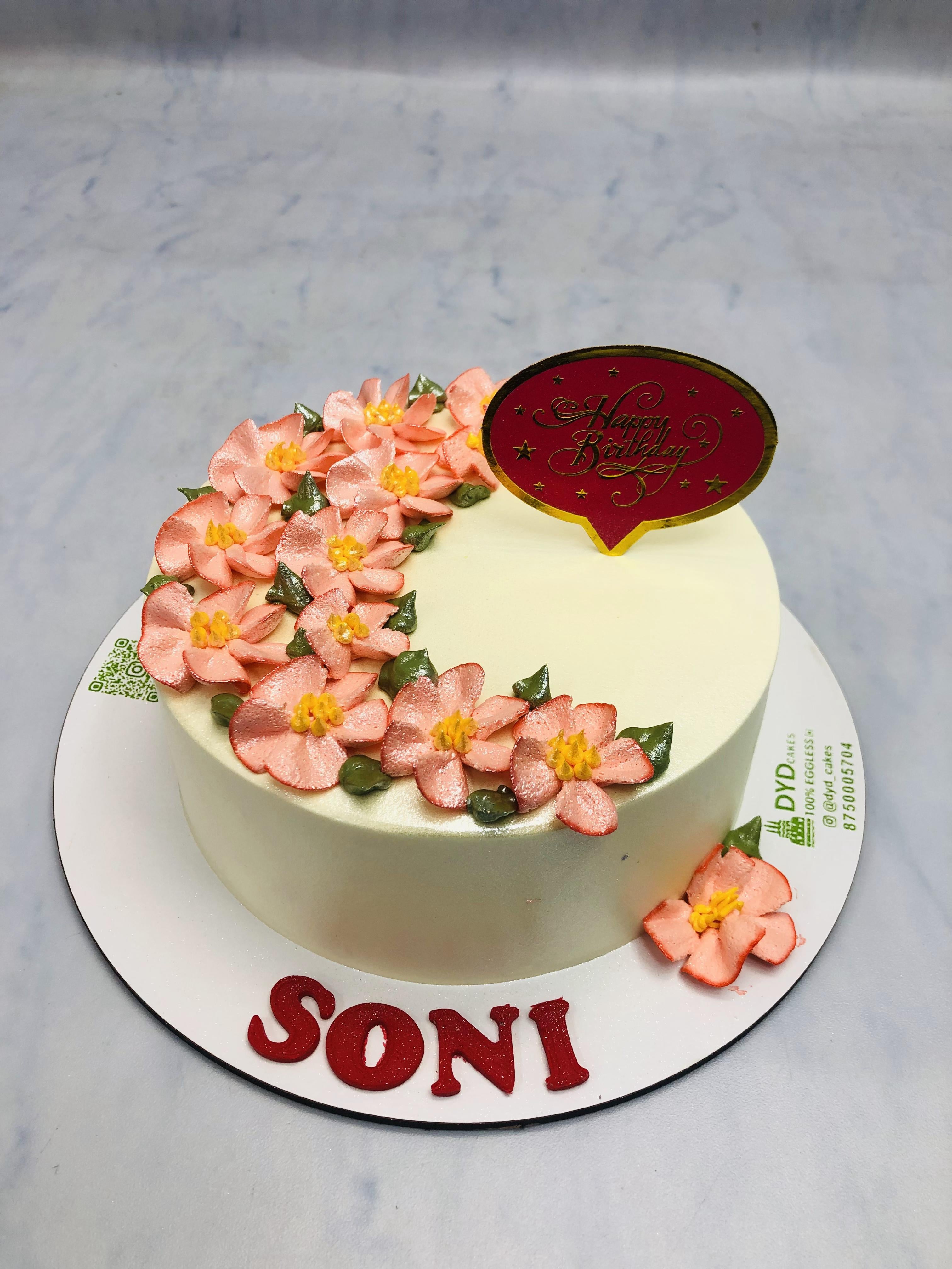 Peach Color Flowers on White Cake