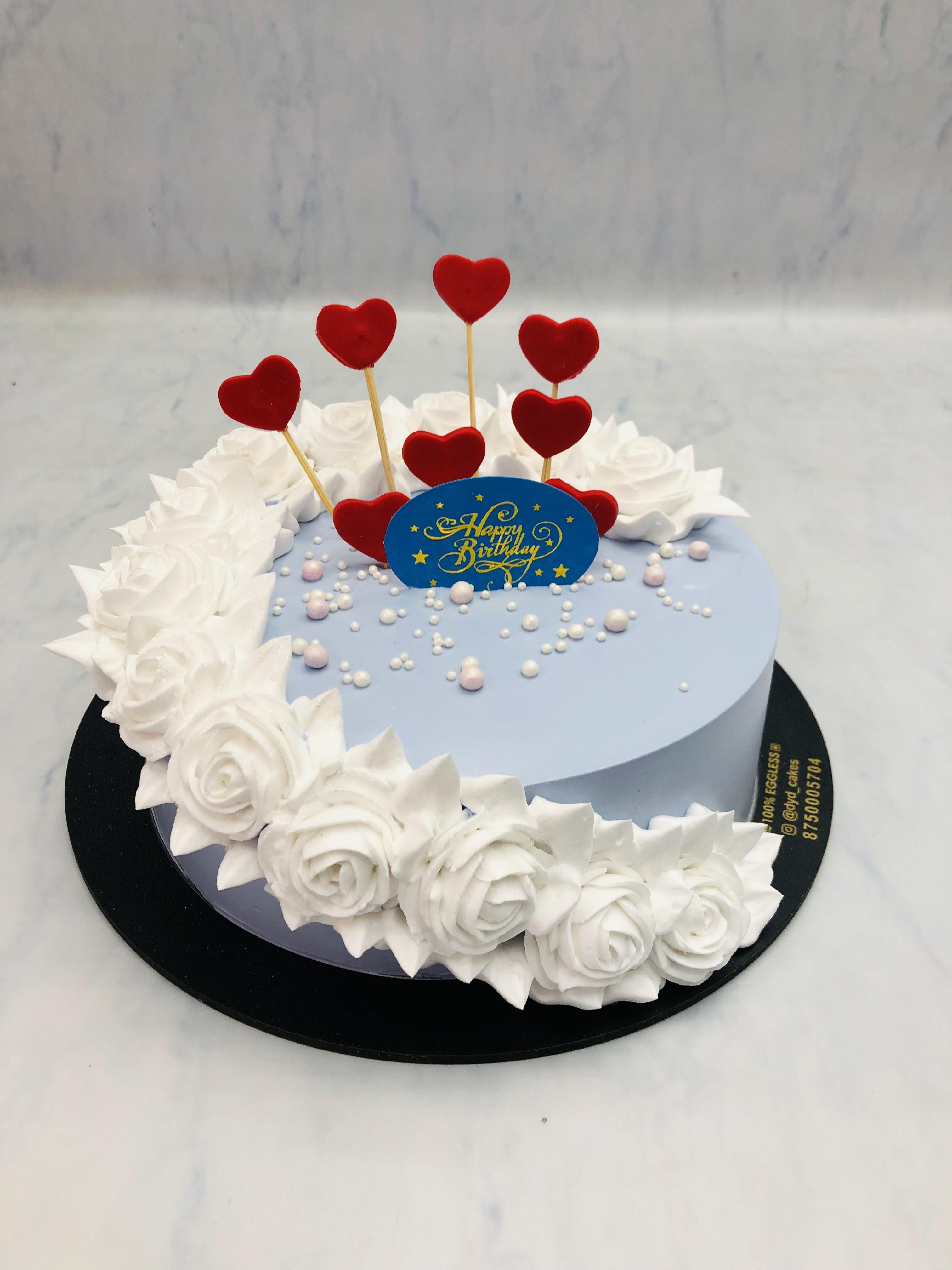 White Floral & Hearts on Blue Cake