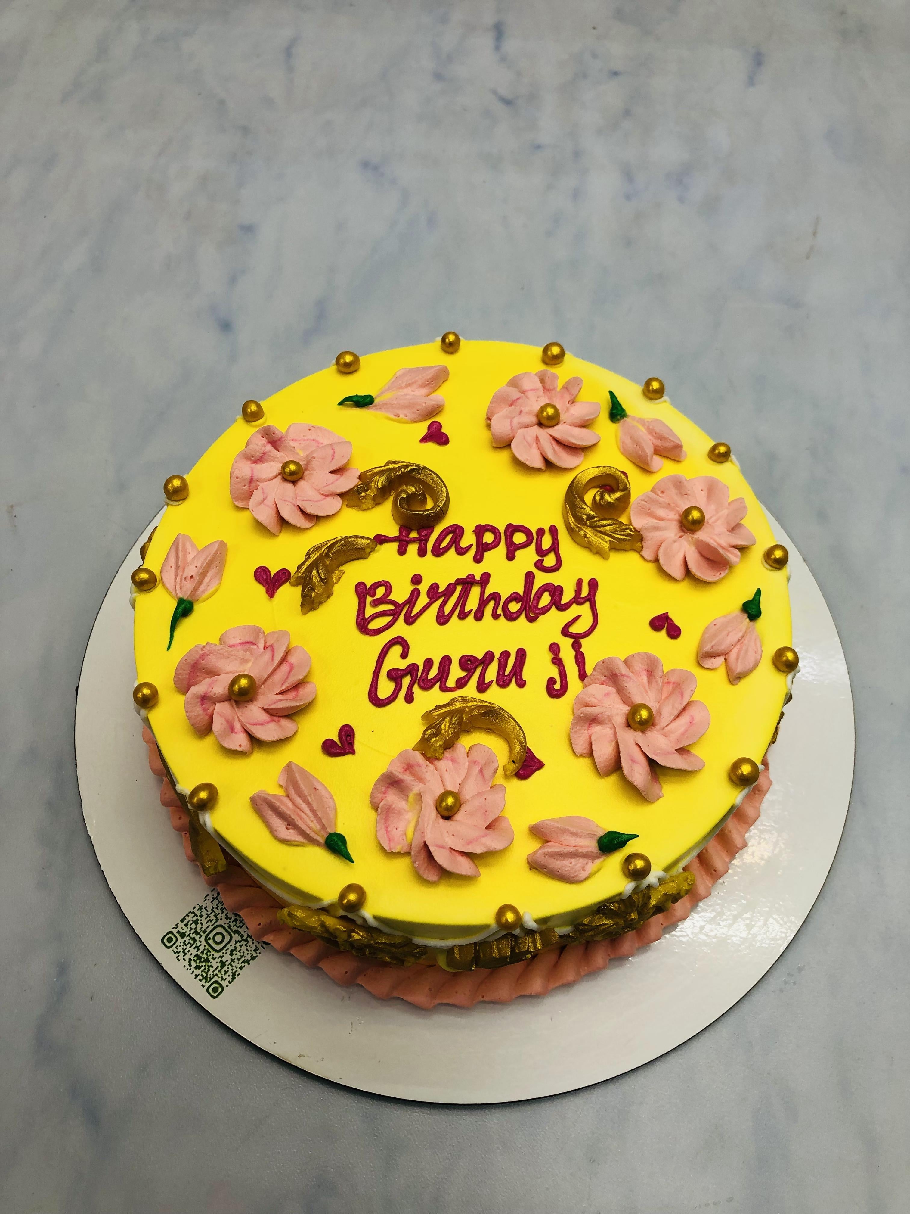 Pink & Golden Flowers on Yellow Cake