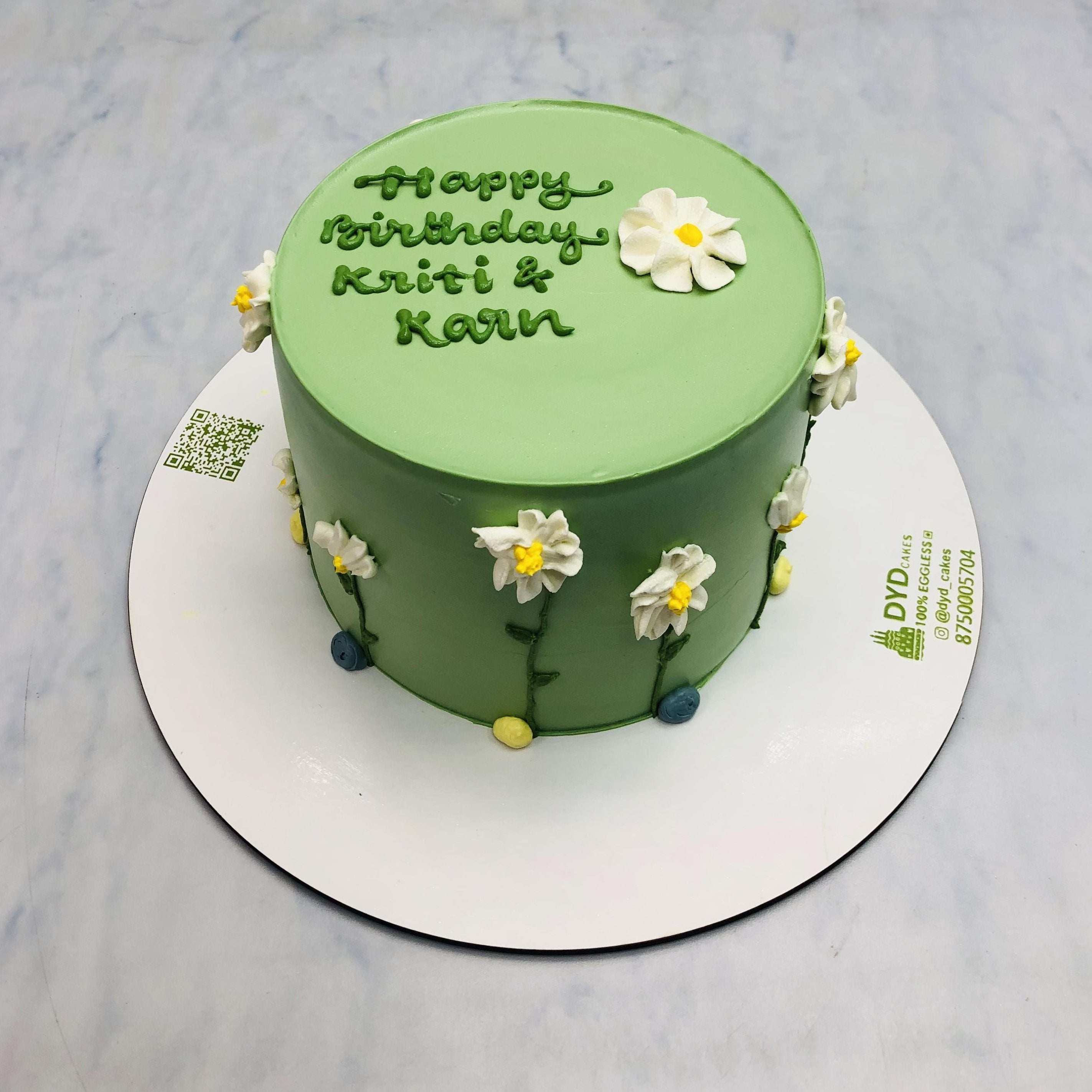 Beautiful Green Cake with White Florals