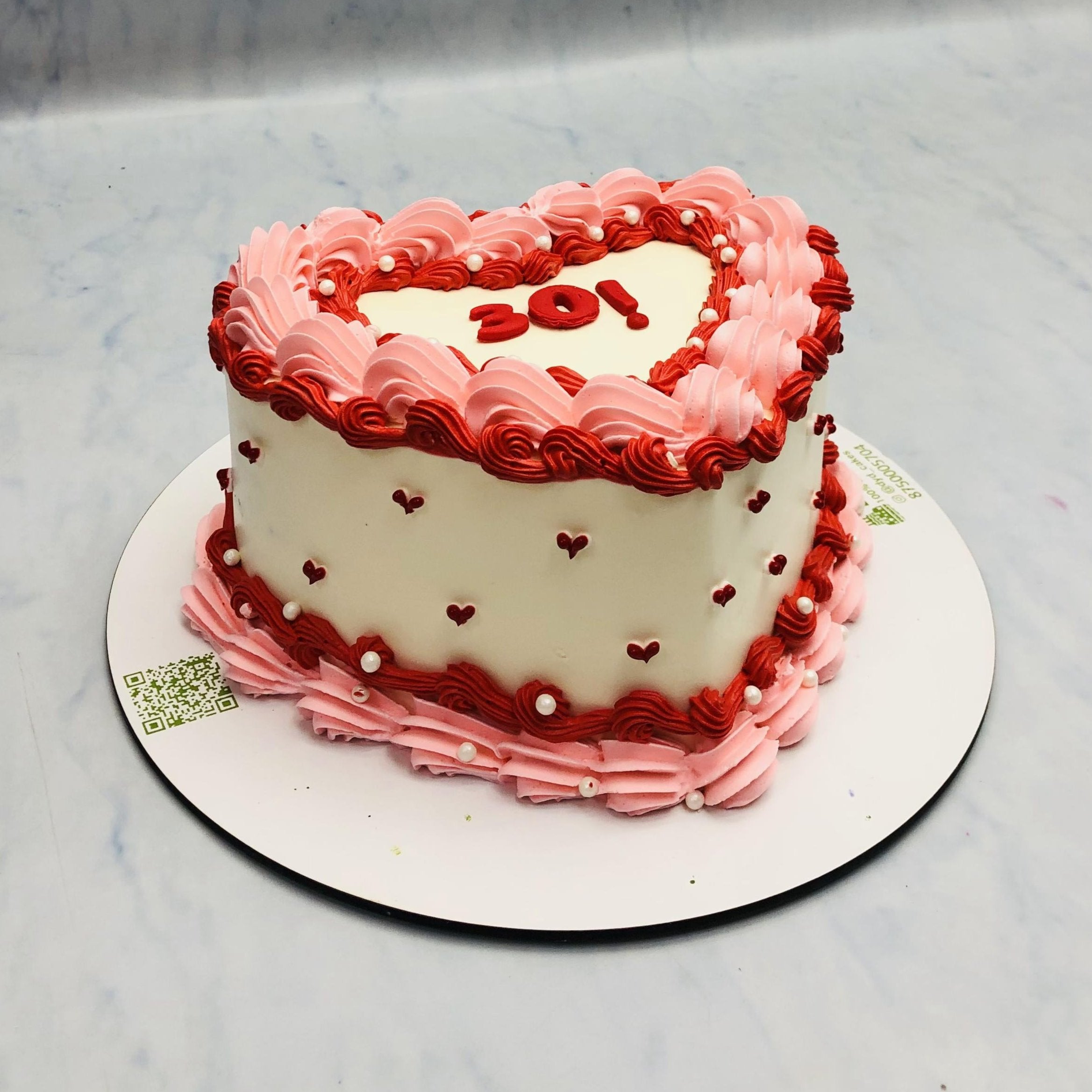 Pink Red Truffle on White Heart Cake