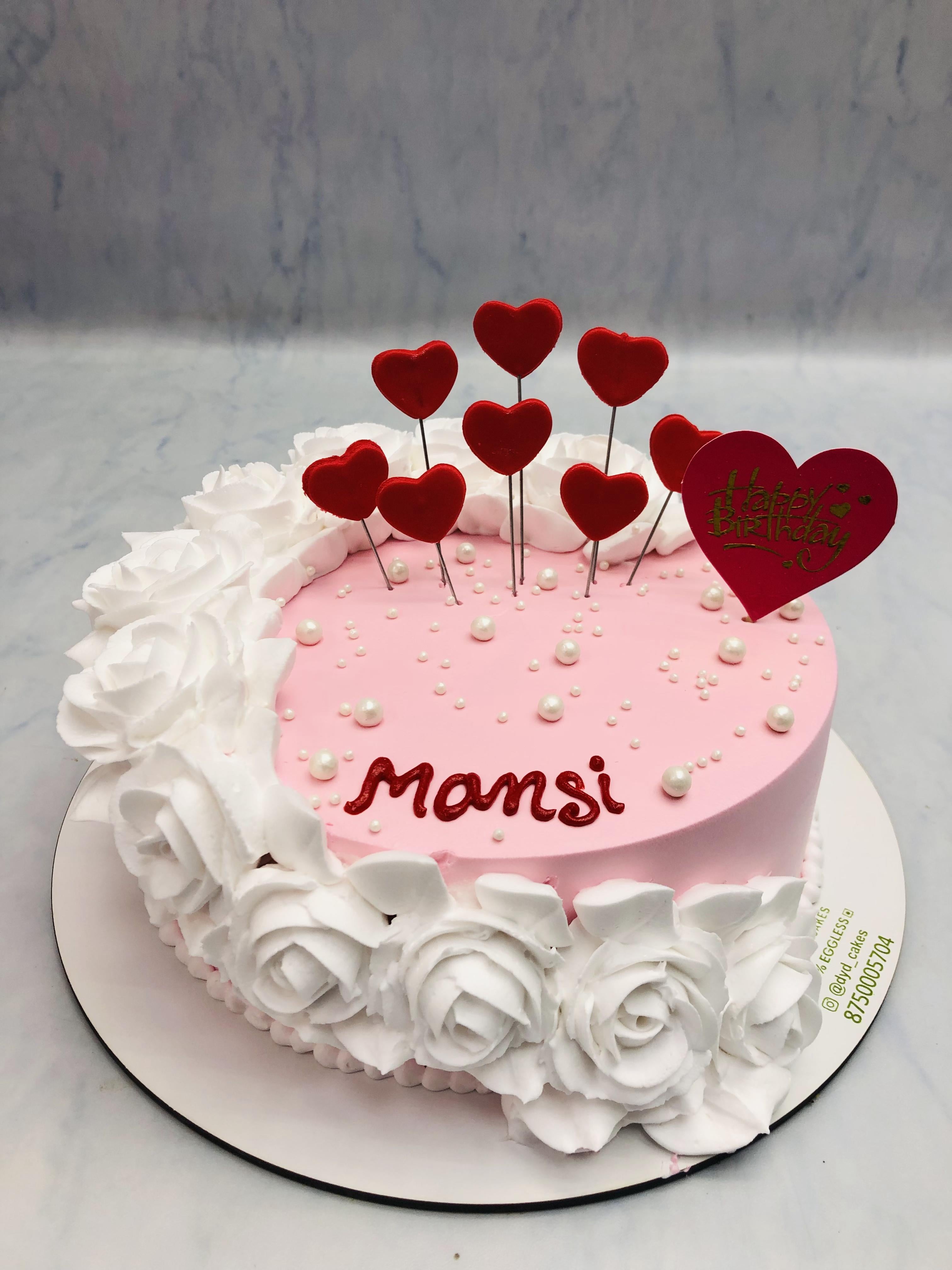 White Florals on Light Pink Cake