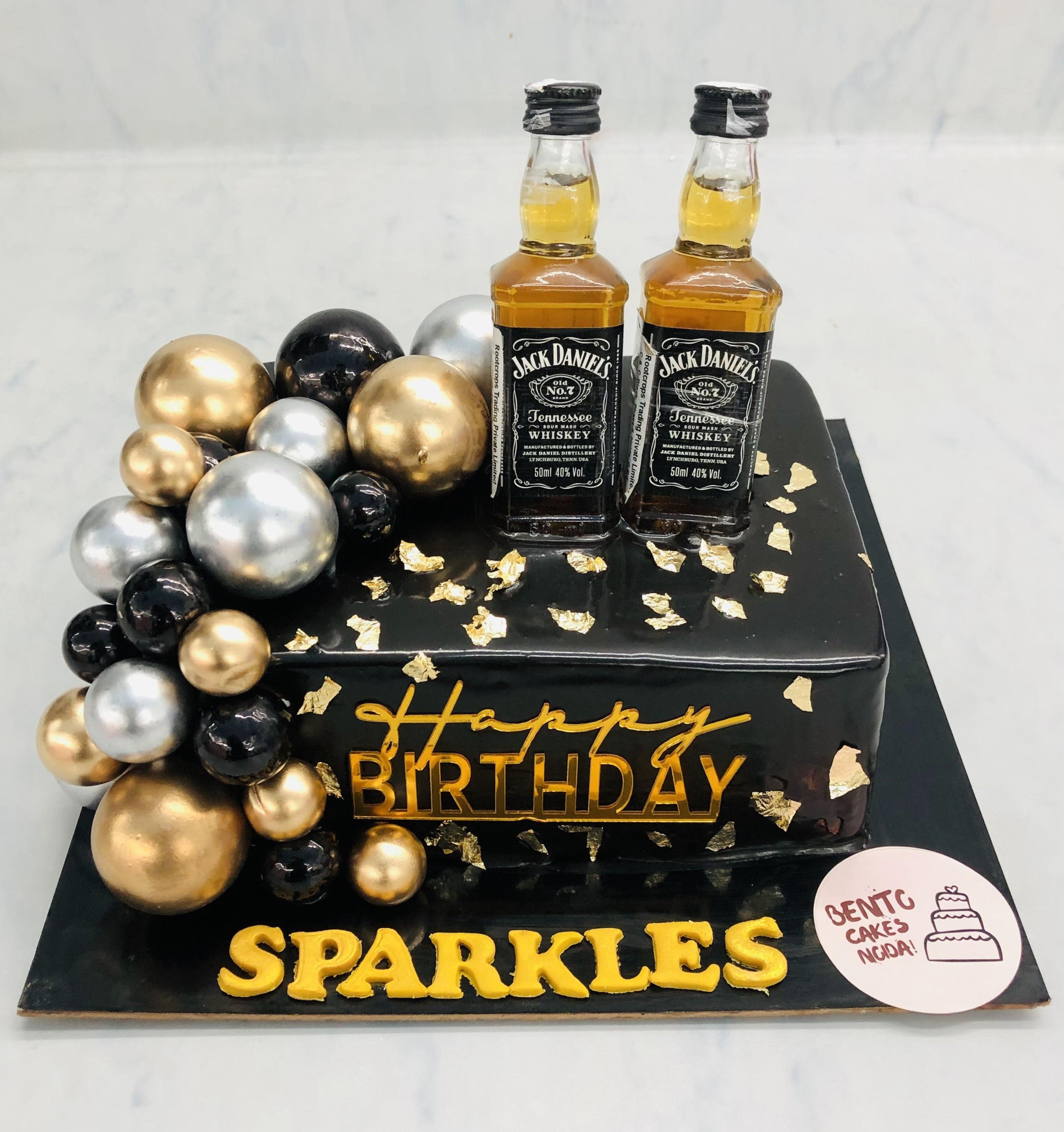 Chocolate Black Cake With Alcohol Bottle