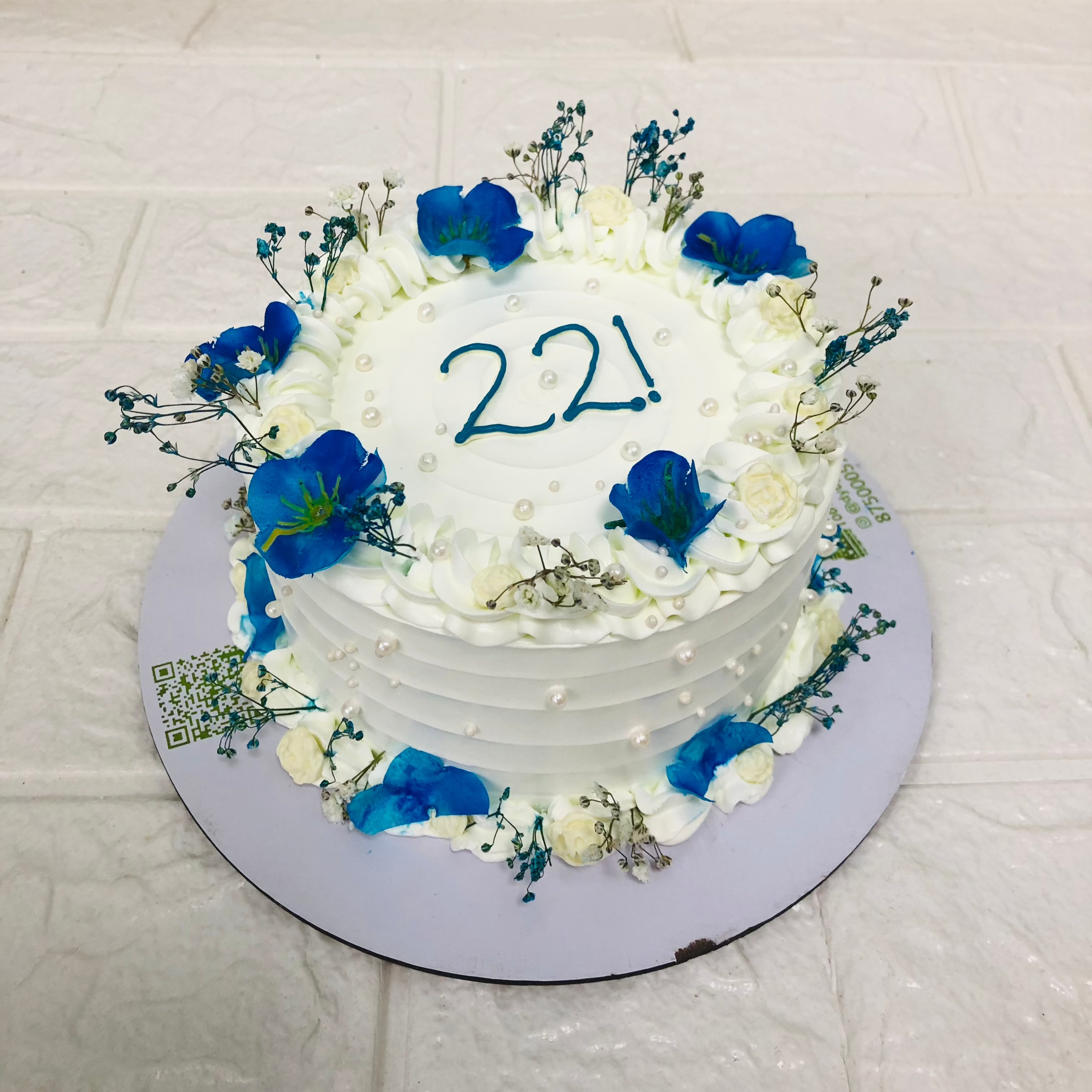 White Cake With Blue White Florals 2