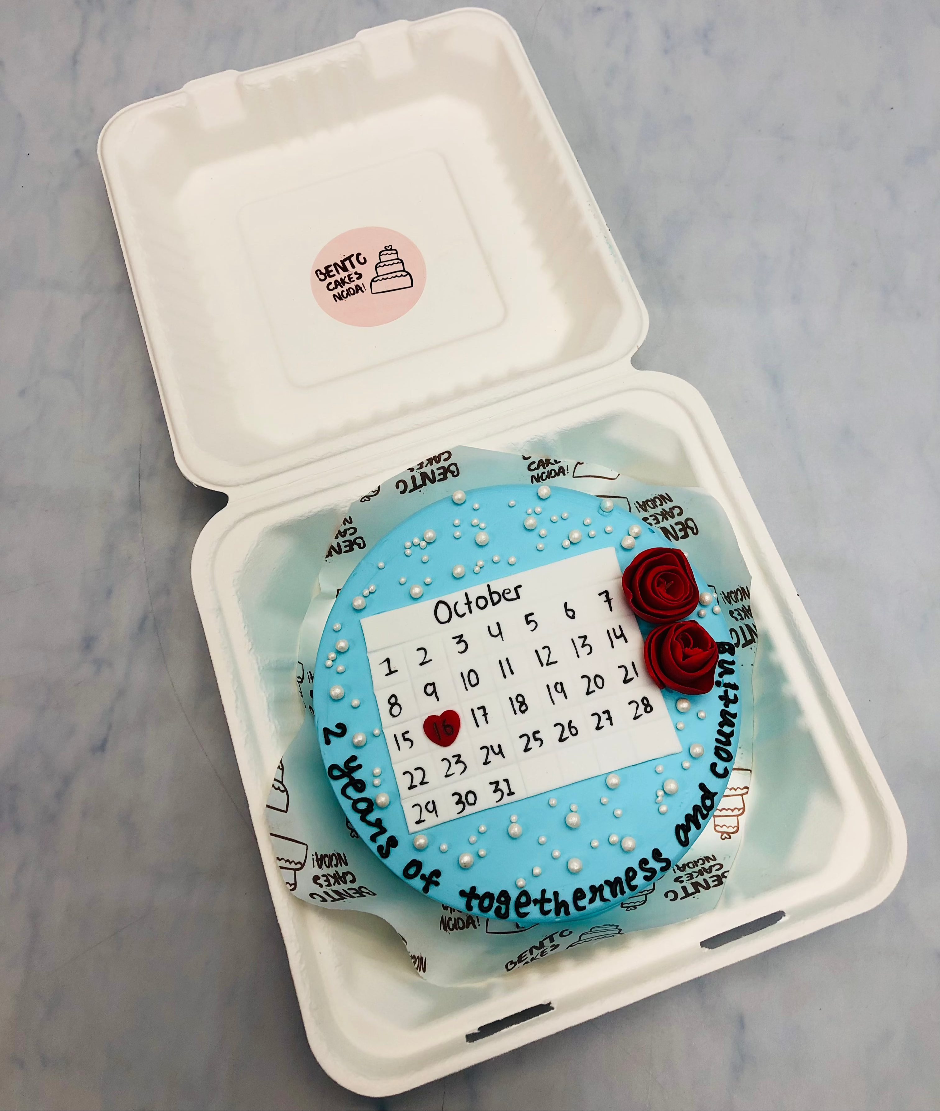 Light blue 2nd anniversary theme calendar bento cake.