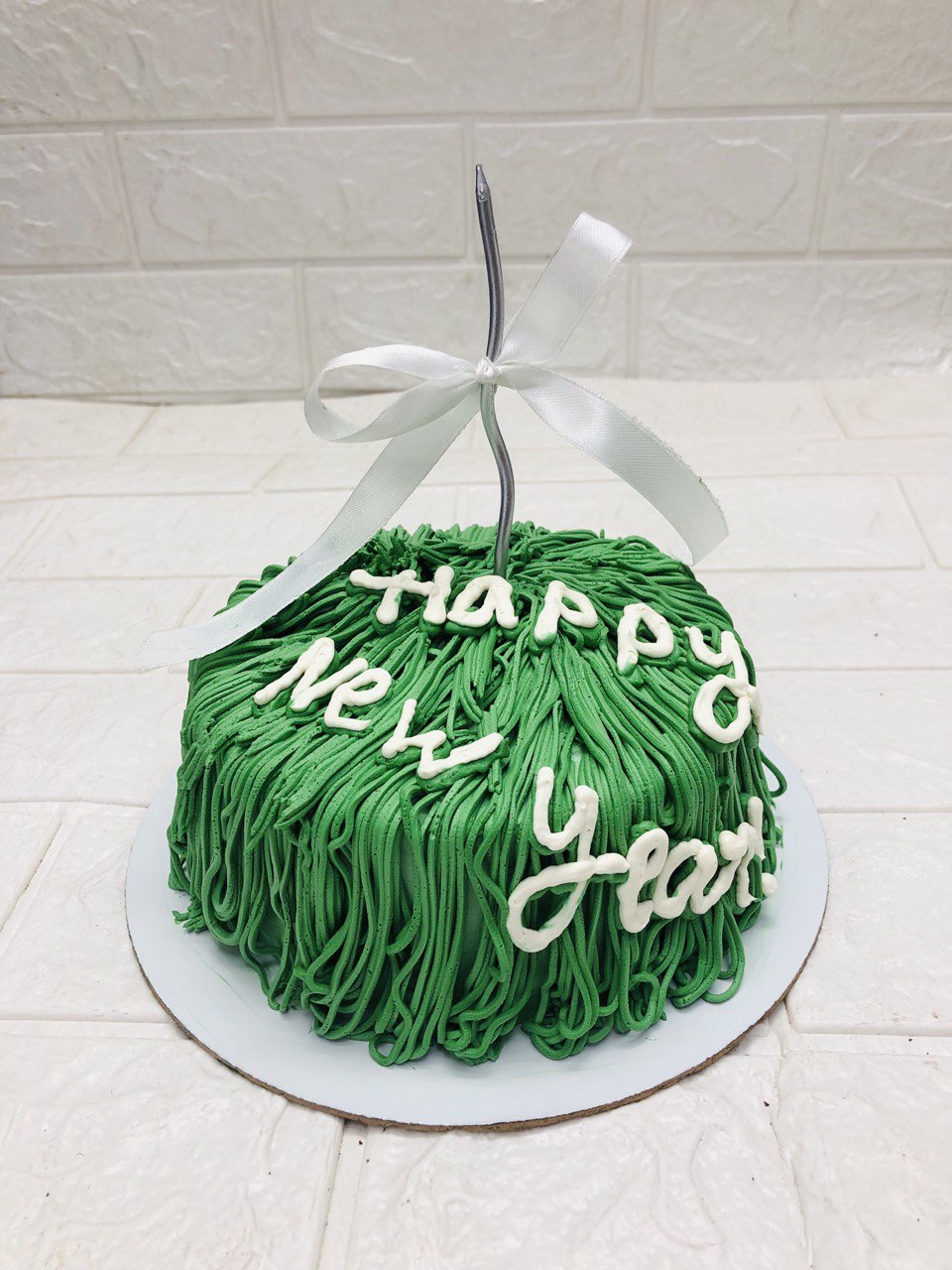 green colour Happy New Year Cake