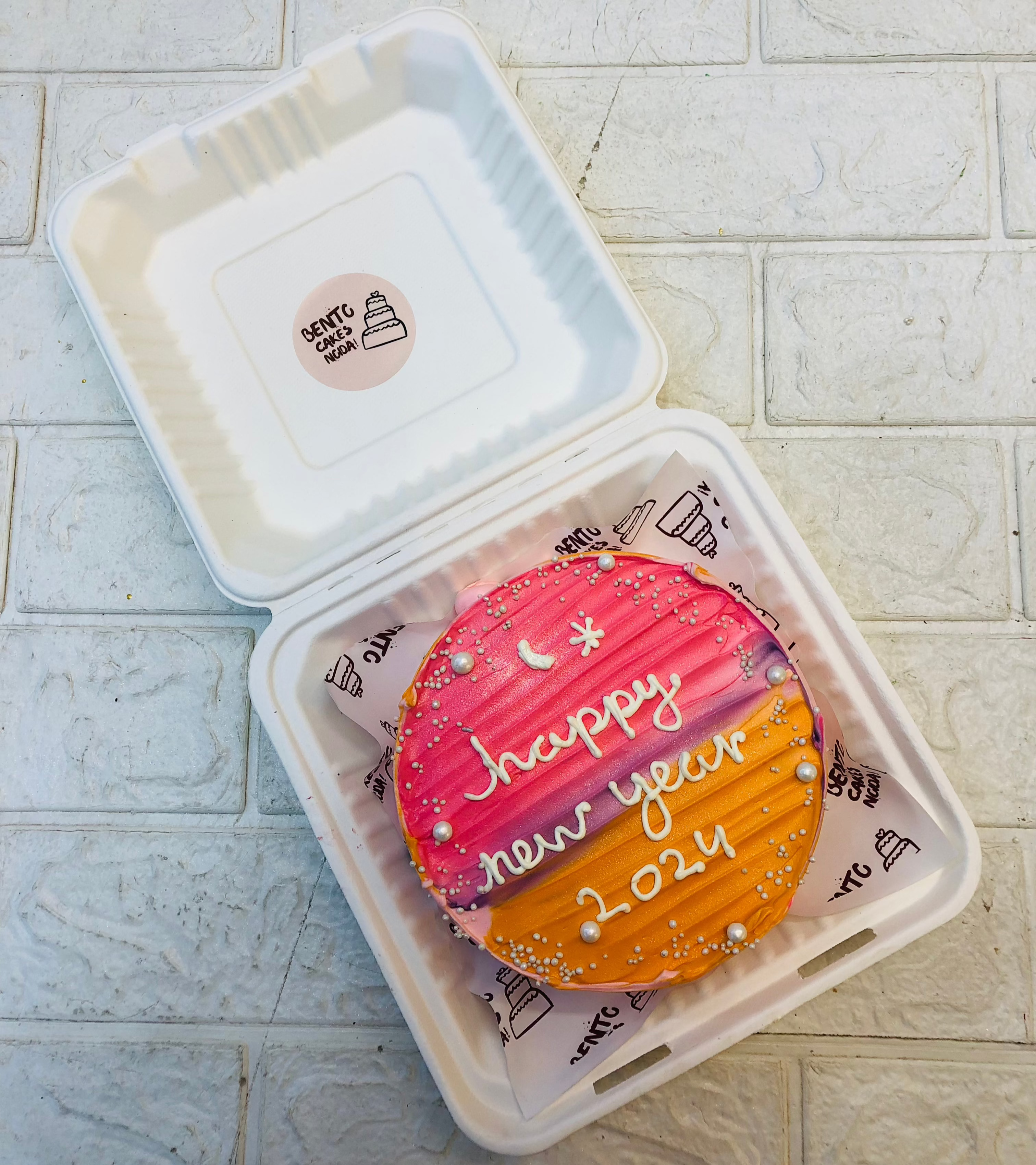 Aesthetic multiple colors bento cake is designed for new year celebration.