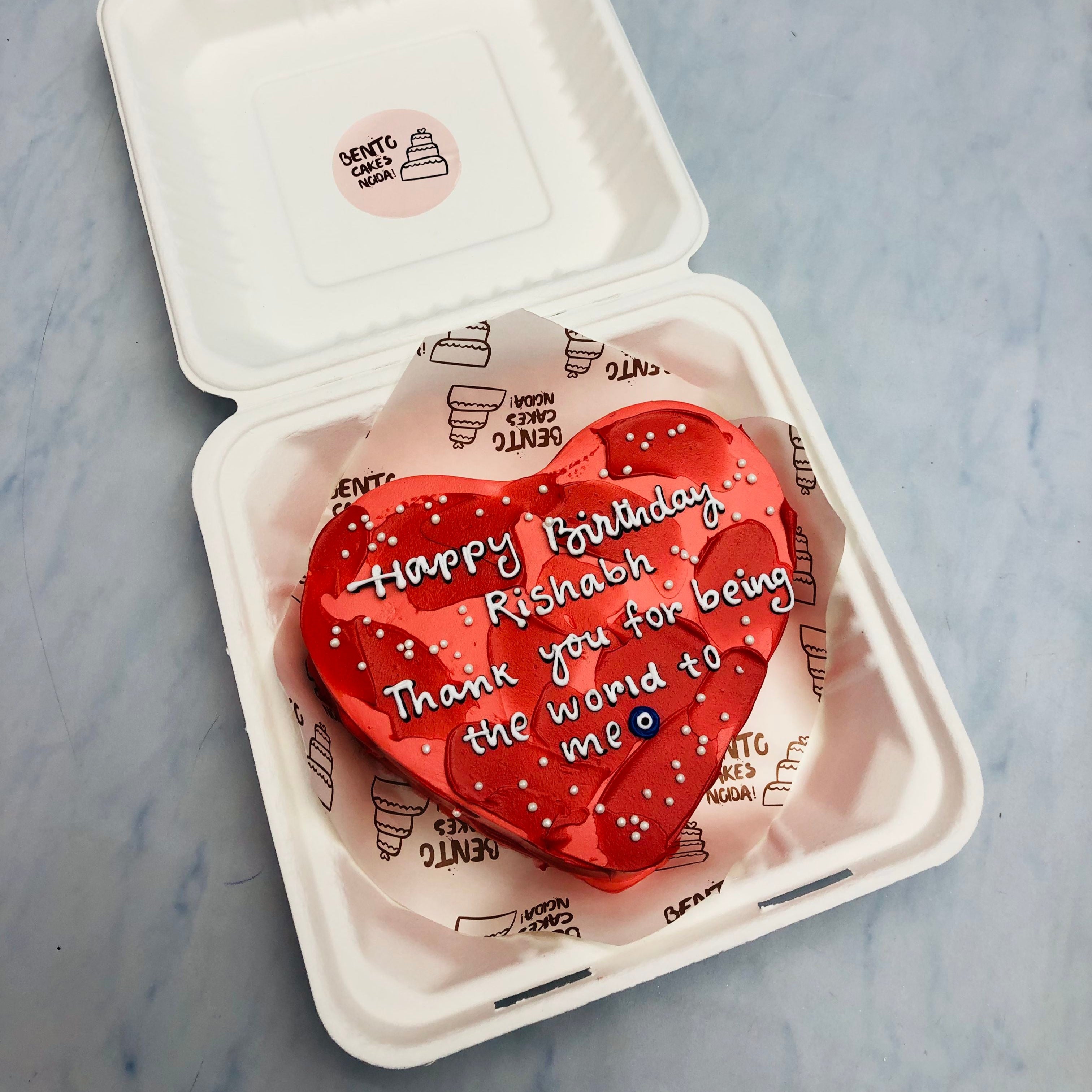 AN aesthetic red shades heart shape cake for expressing your love.