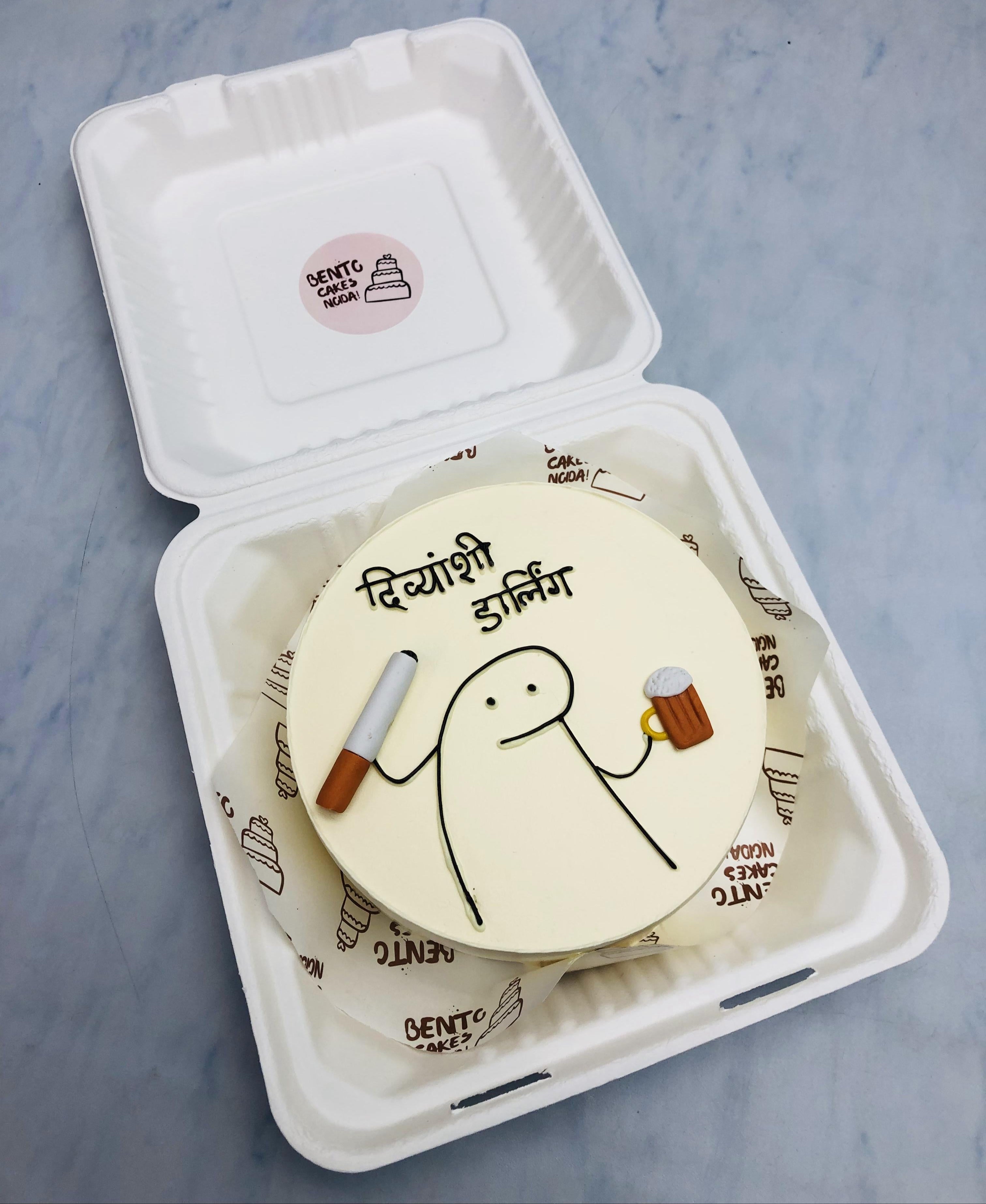 An alcoholic mimi design on offwhite bento cake for birthday.