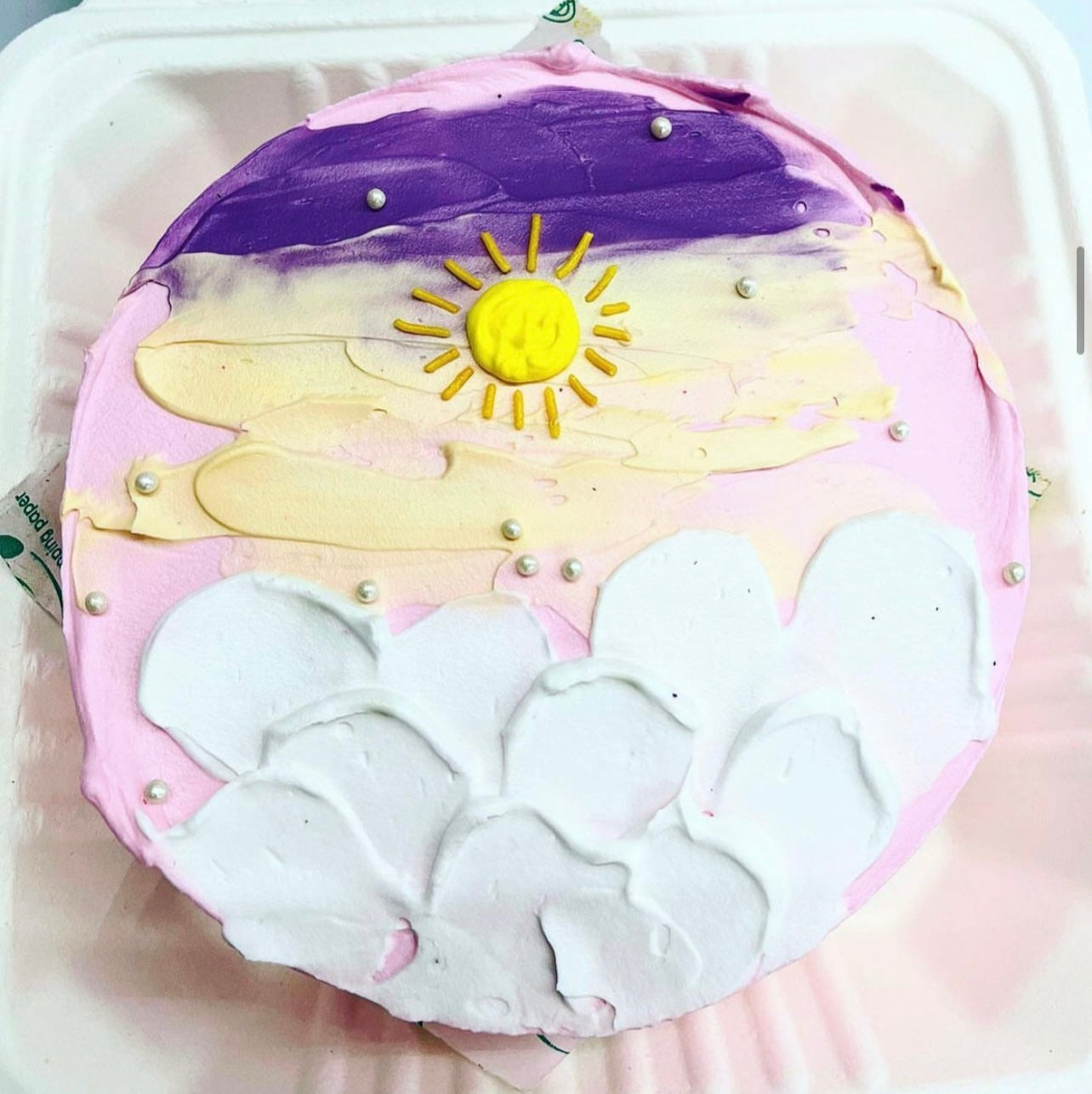 Cake is designed with the sunrise theme and is looking very beautiful.