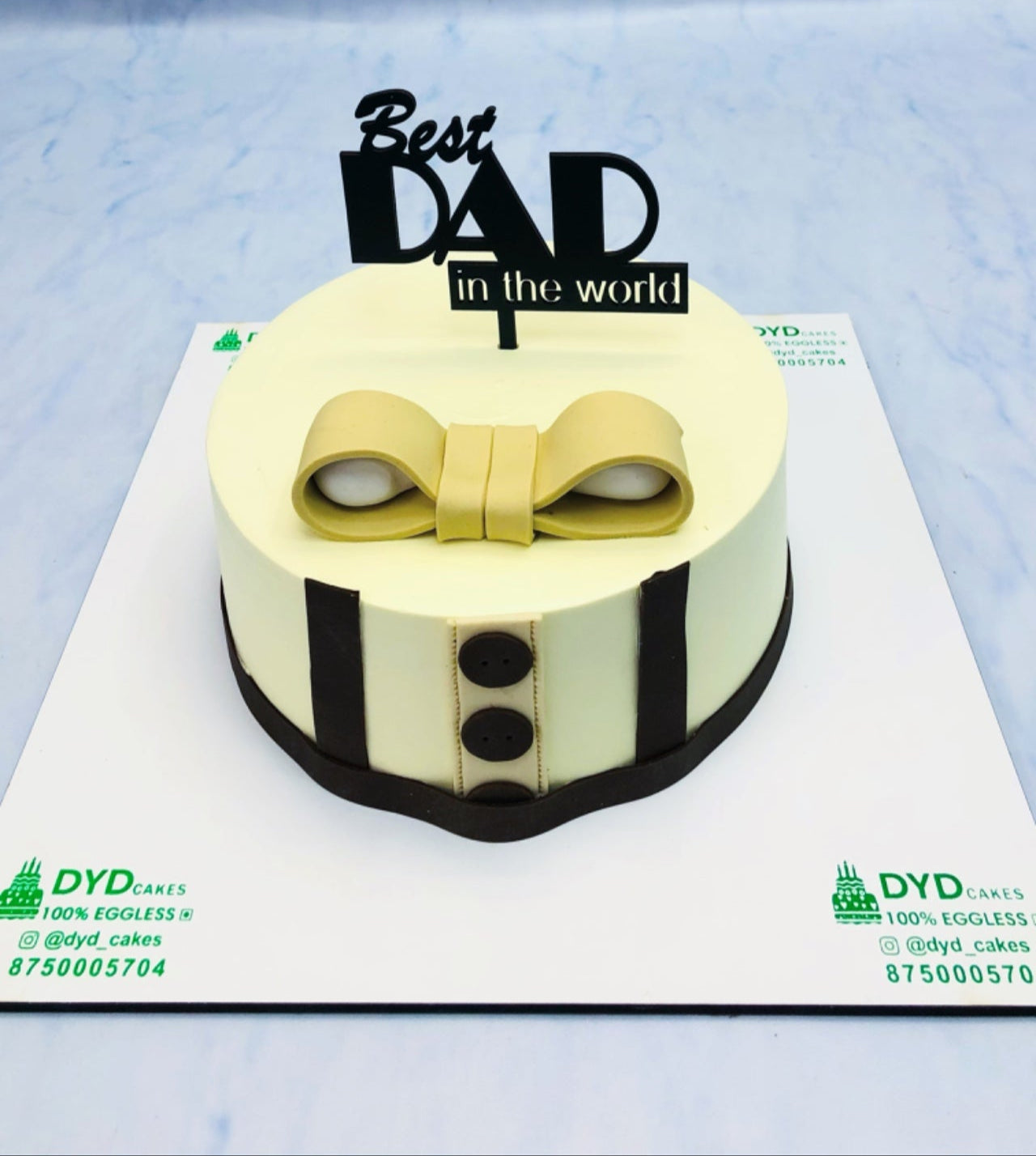 A Best Dad Theme Cake with fondant design.