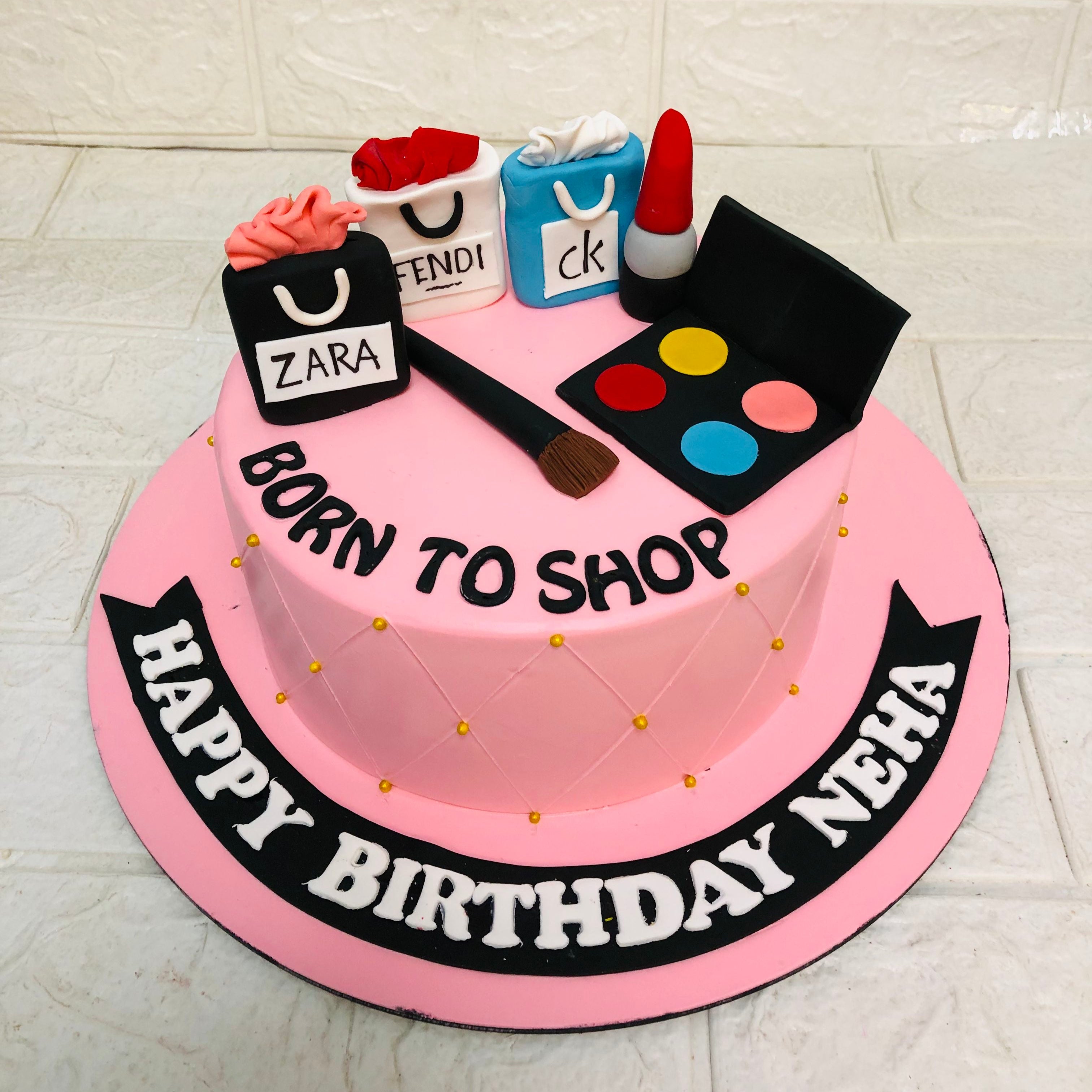 A pink cake adorned with makeup items and topped with a festive birthday hat, celebrating a special occasion.