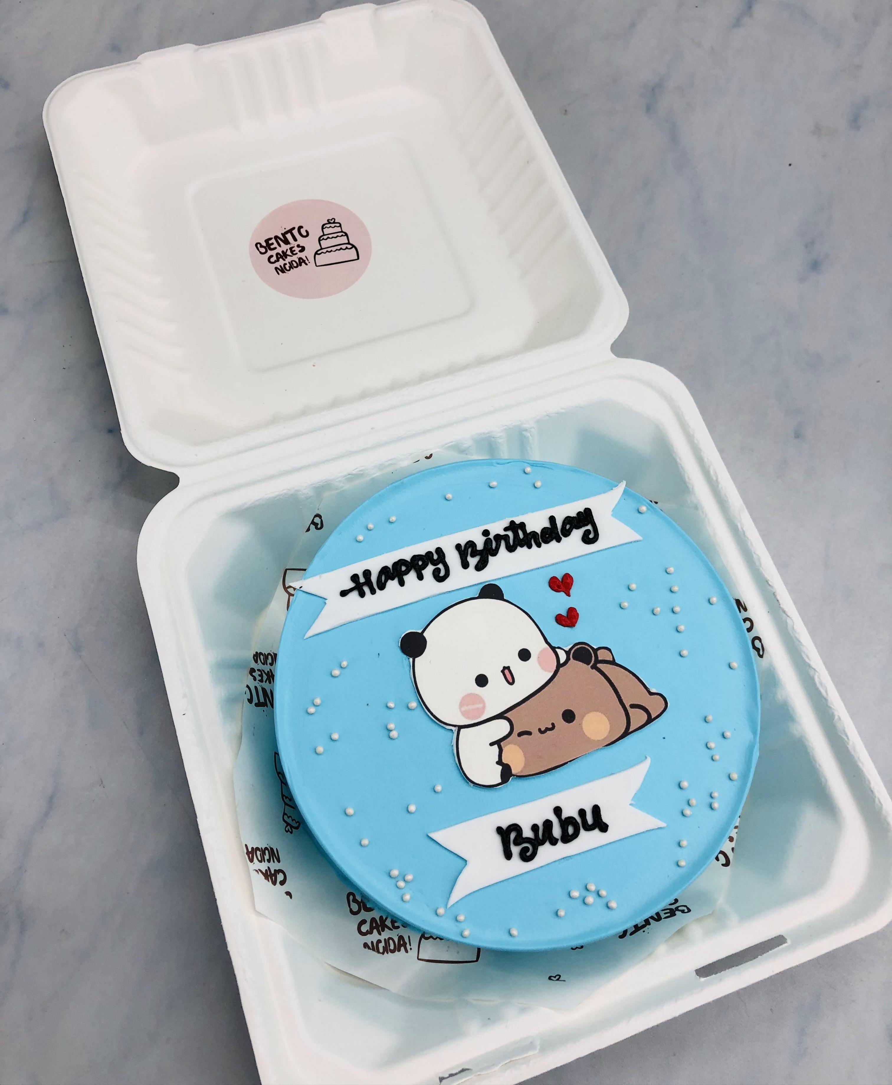 A skyblue bento cake with seepy bubu print and dudu celebratng his birthday.