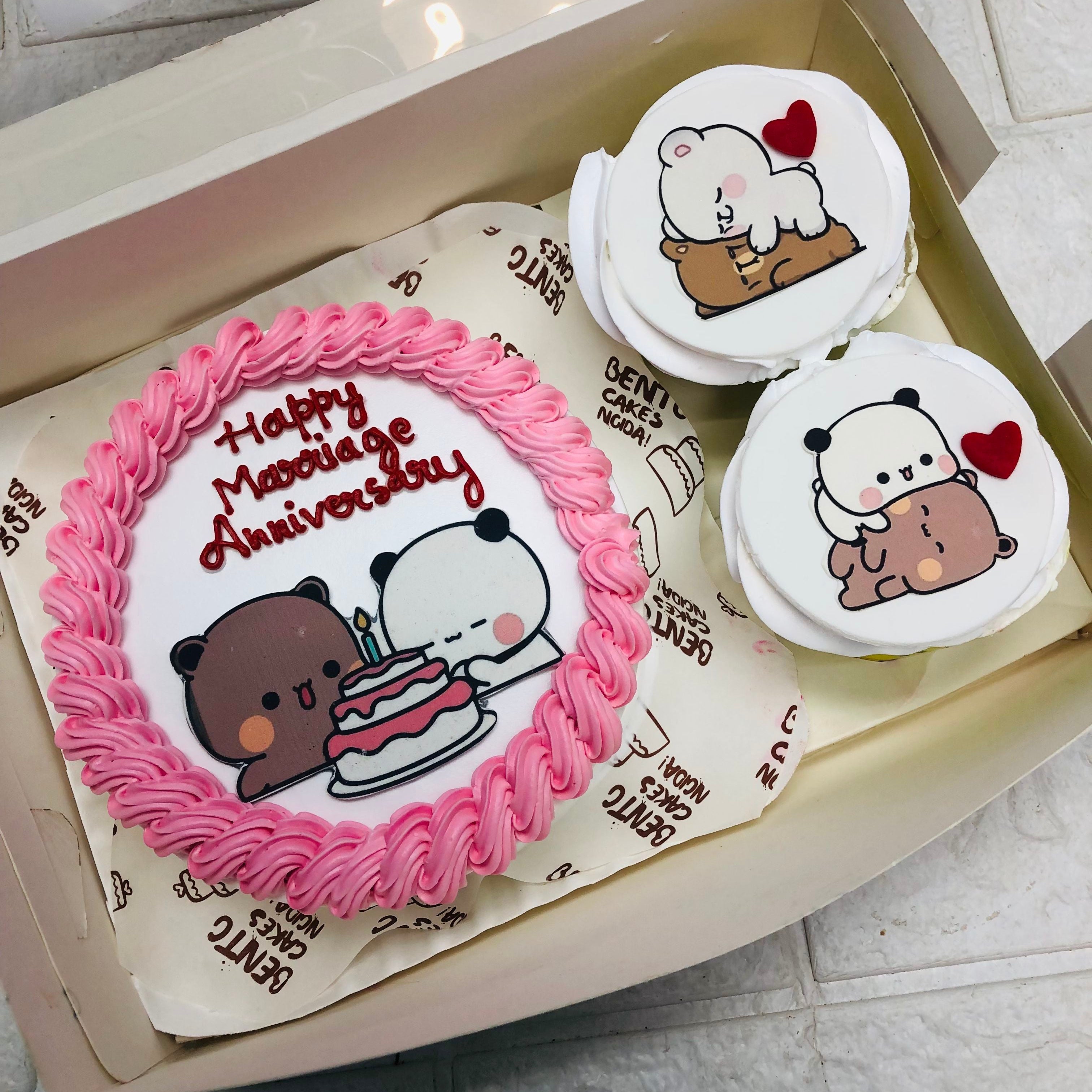 A beautifully decorated box of cupcakes adorned with charming bubu and dudu illustrations, perfect for any celebration.
