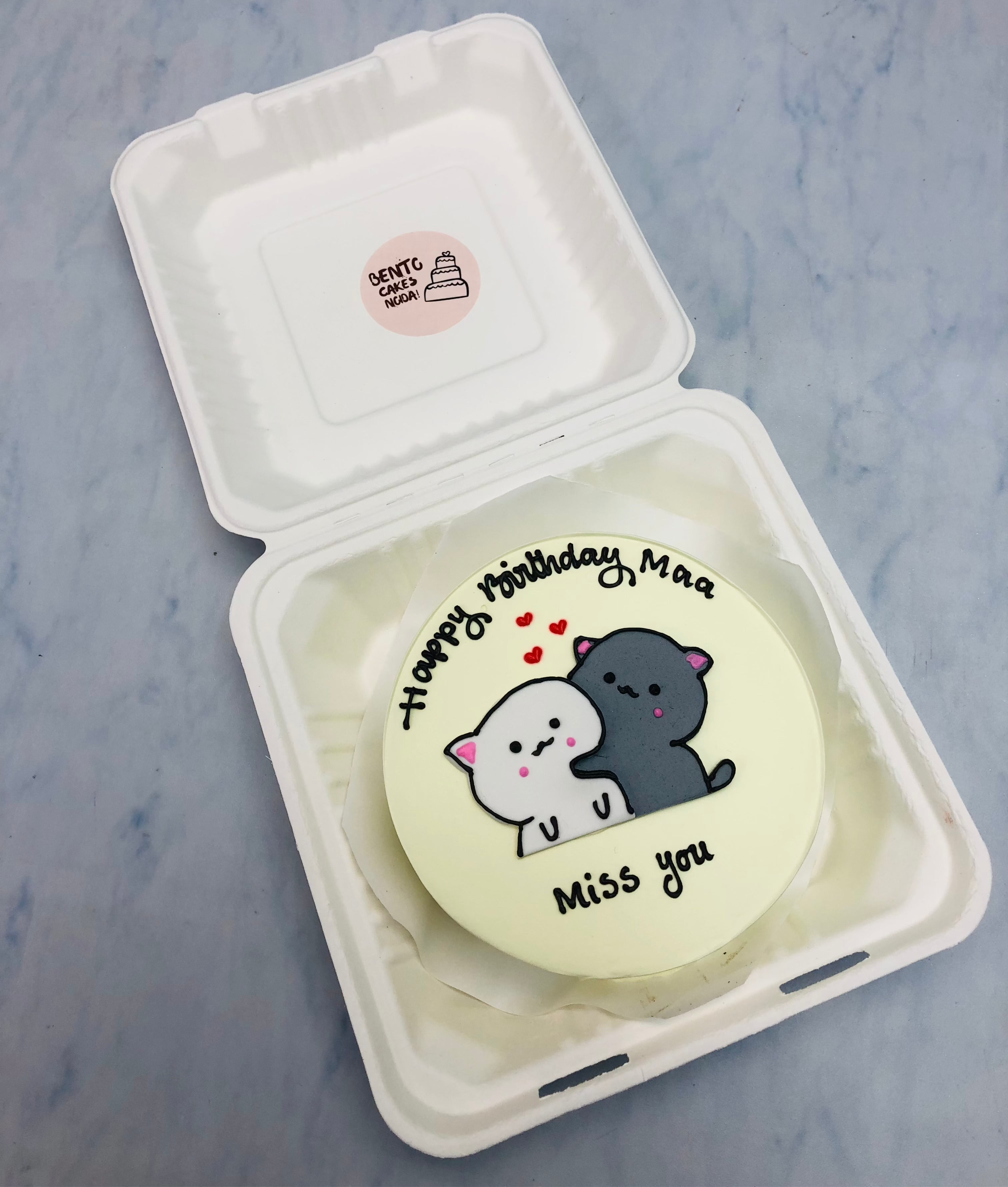 A offwhite bento cake with bubu dudu design for mom's birthday.