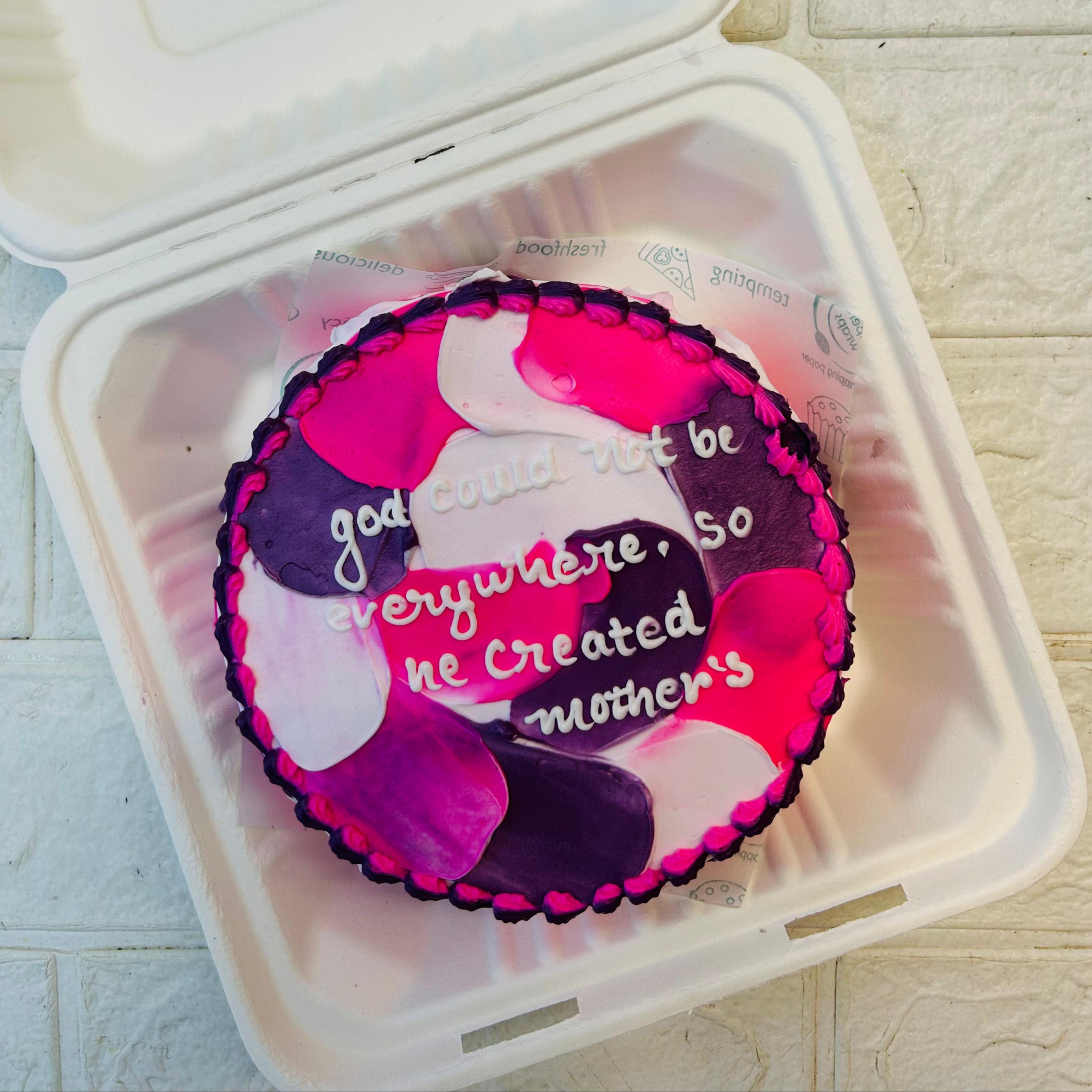 An aesthetic colorful shades on cake with beautifull message written for mother.