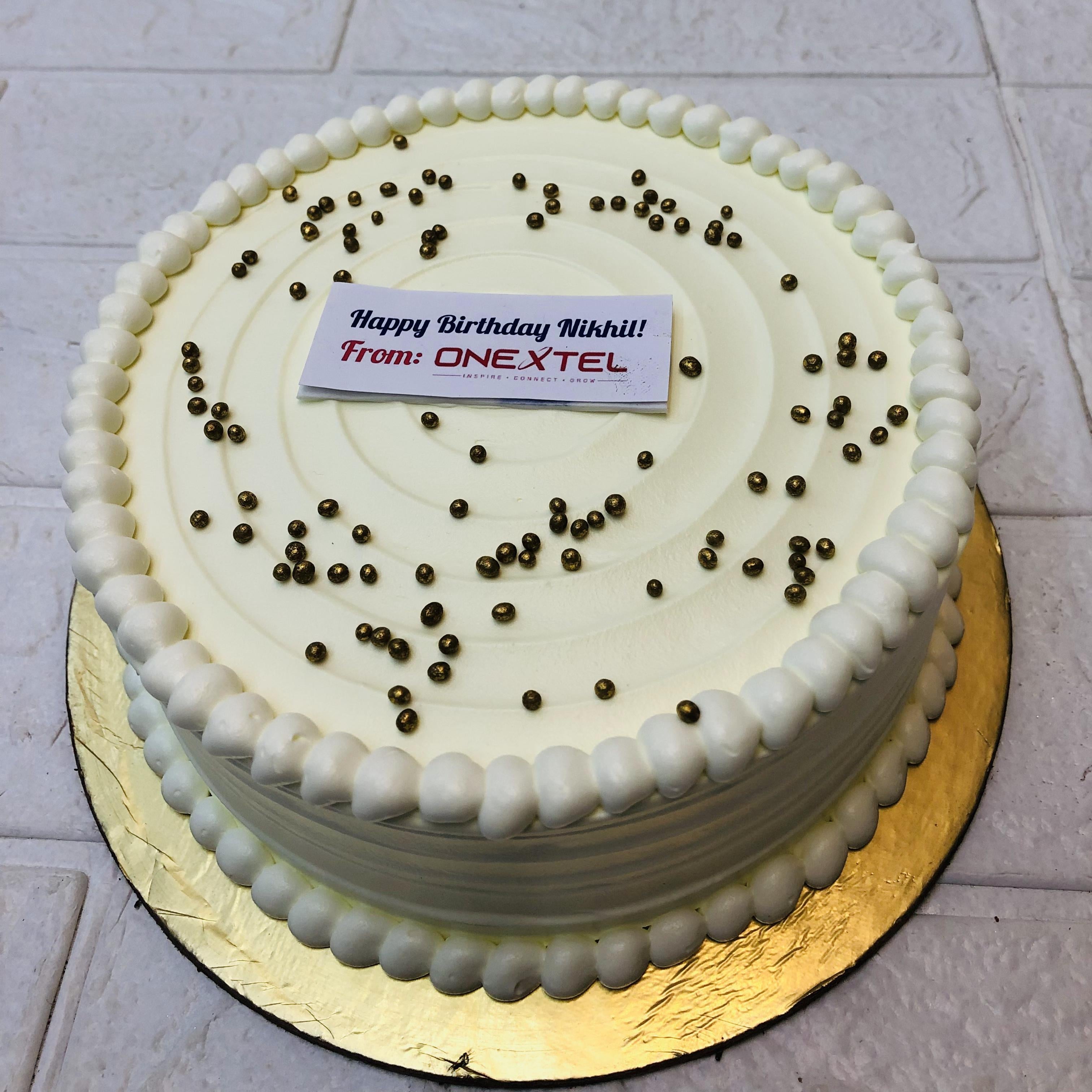 This cake is designed for "ONEXTEL" companies employees birthday.