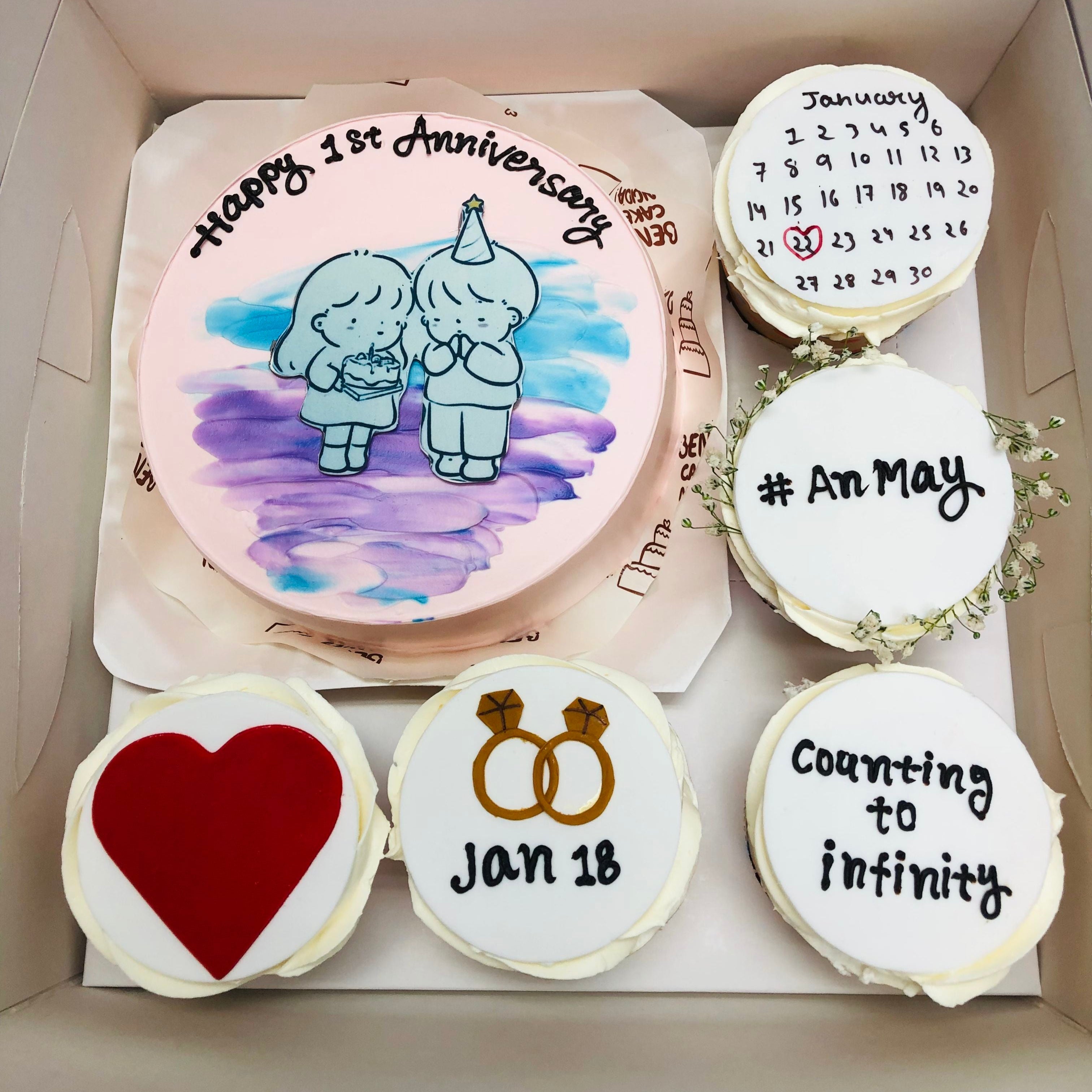 A bento box containing a cake and 5 cupcake s set. All are beautifully designed with different themes. Specially for Anniversary celebration.
