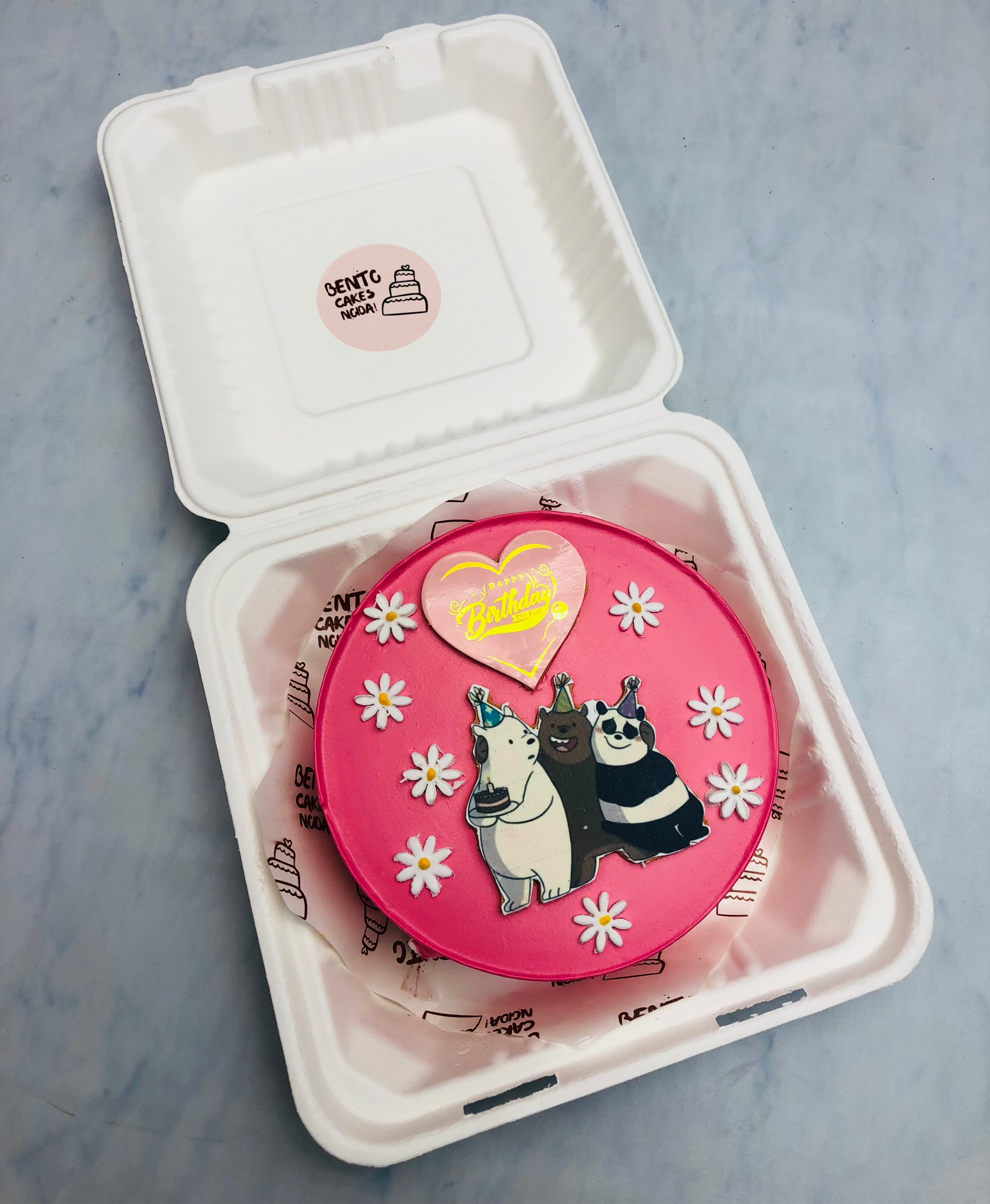 A floral pink bento cake with 3 bear friends image.