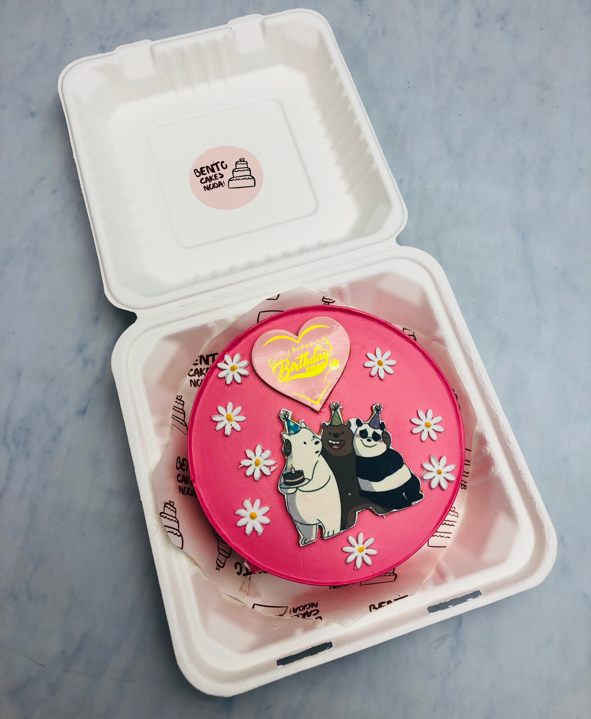 A floral pink bento cake with 3 bear friends image.