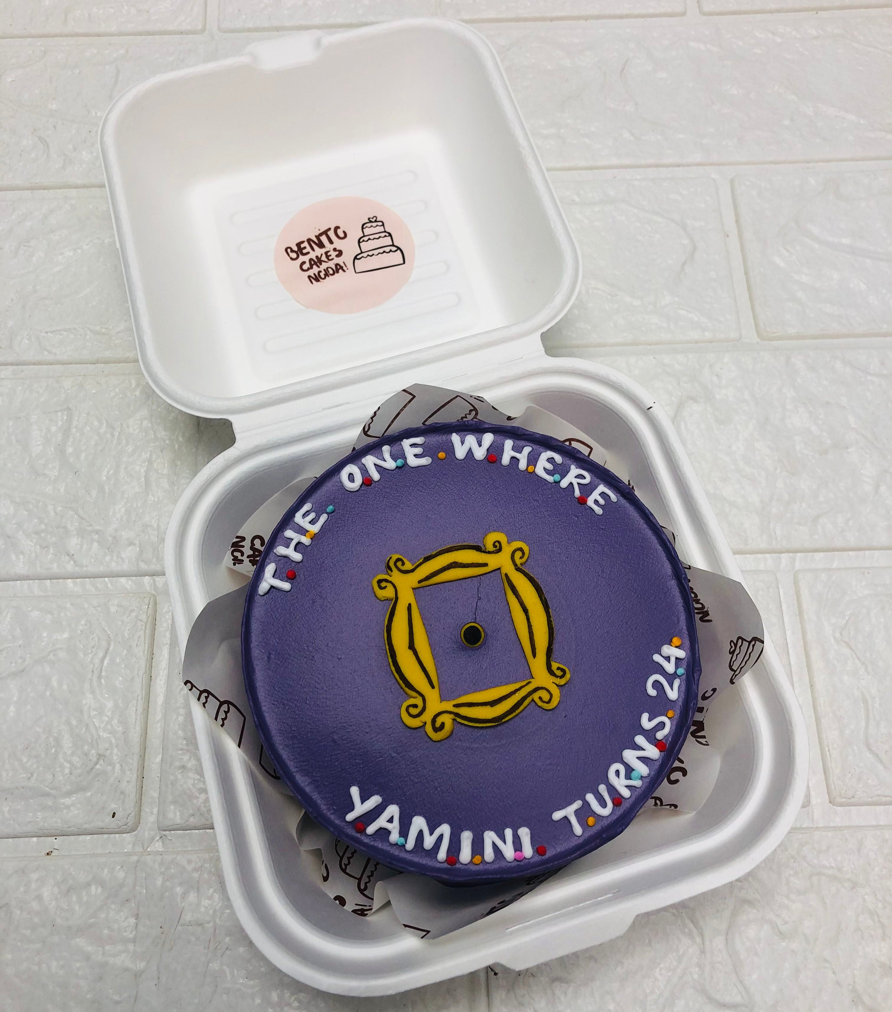 A dark purple mini bento cake designed on fiends series.