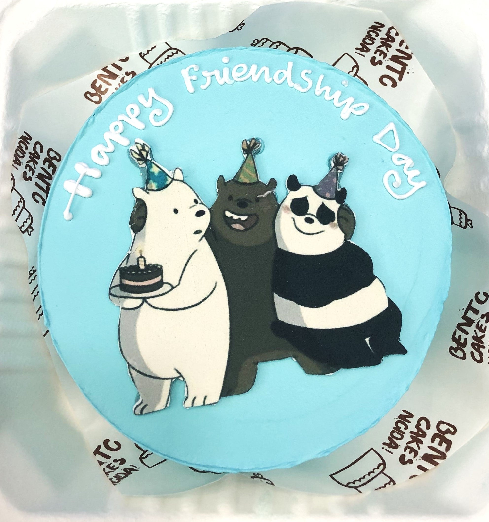 A light blue bento cake with 3 bear friends print for friendship day.