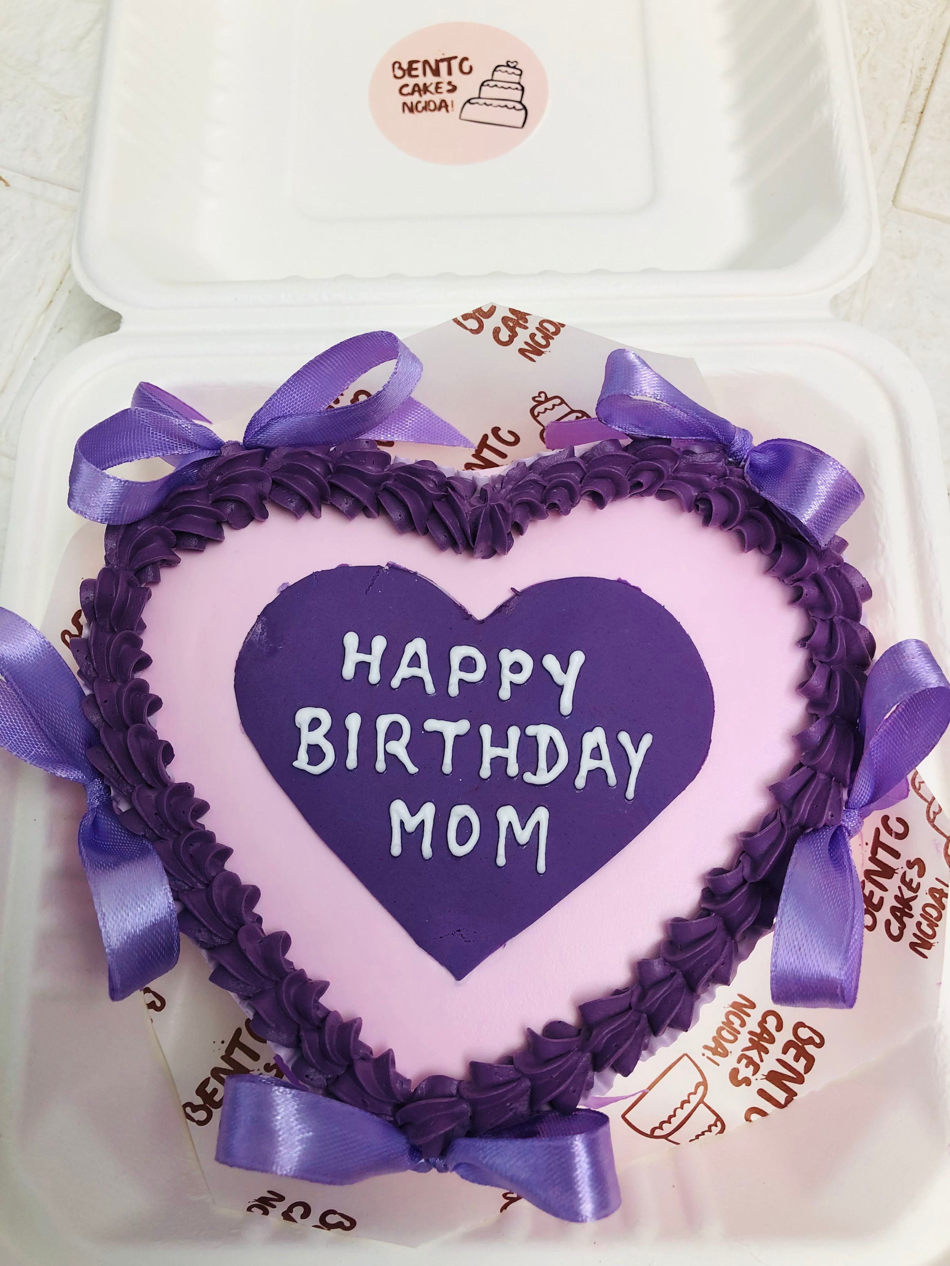 Heart-Shaped Purple Themed Bento Cake for Mom's Birthday in a box with ribbon outside boundary