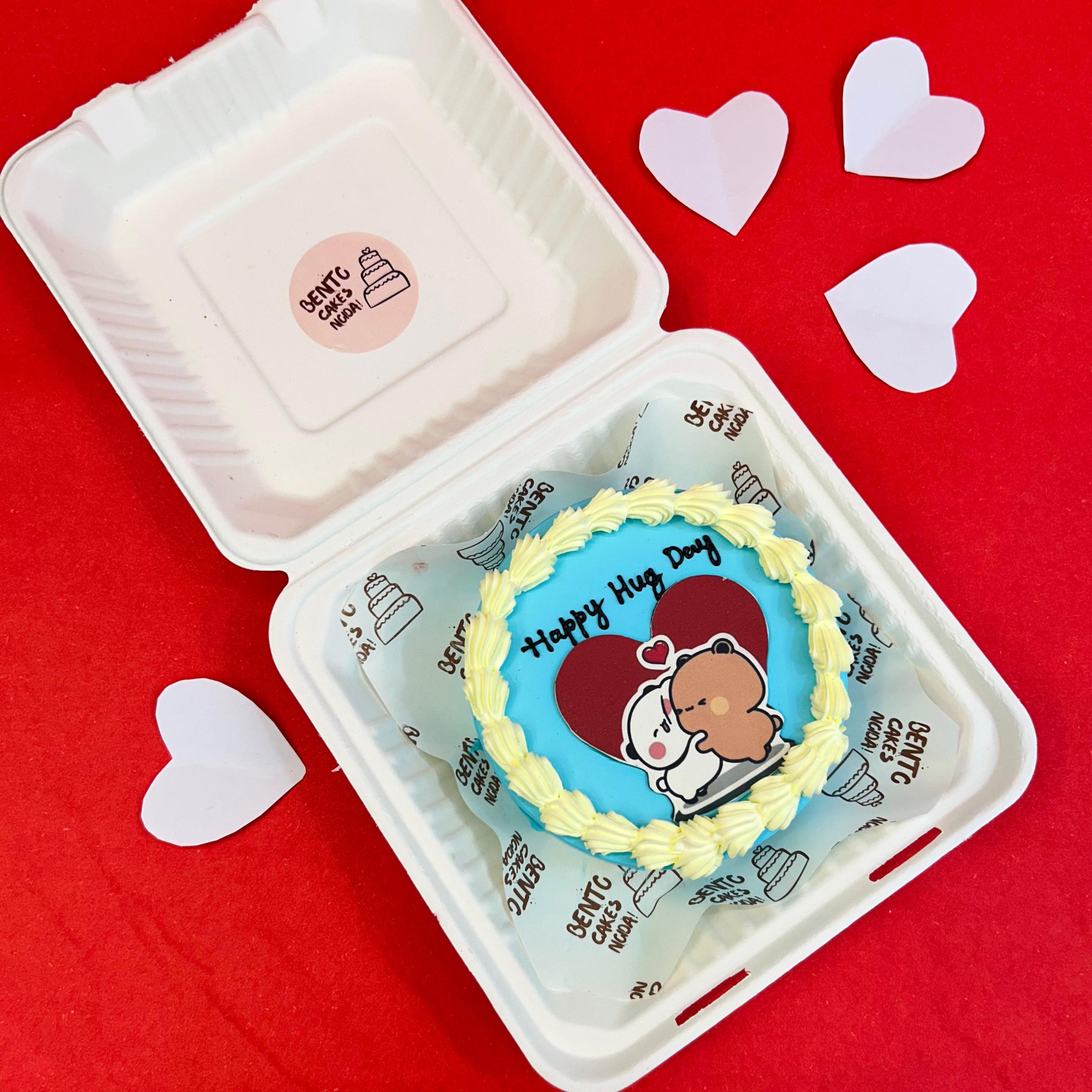 A colorful box of cupcakes featuring the Bubu Dudu cartoon character, perfect for celebrating Hug Day with sweet treats.