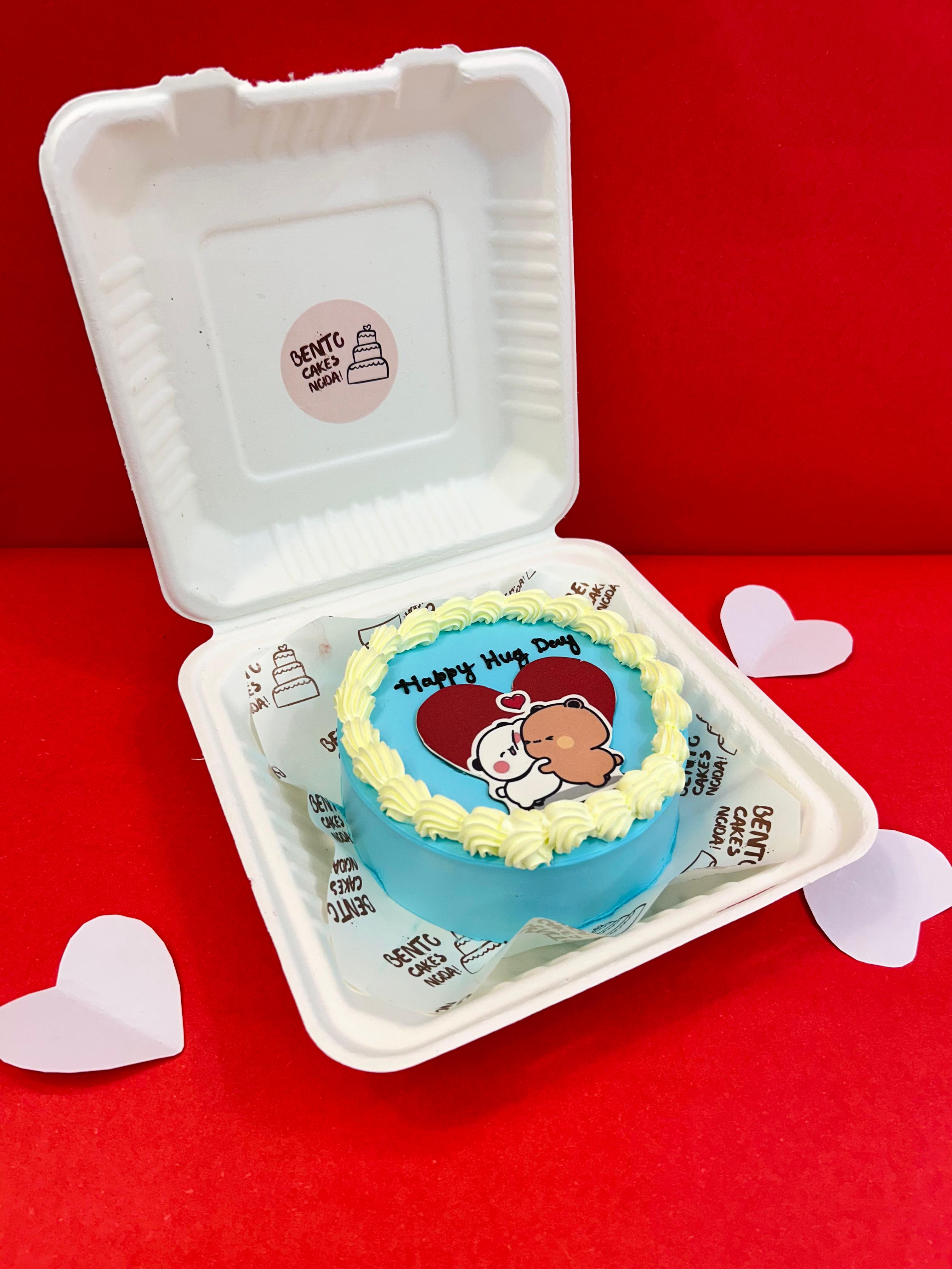 A colorful box of cupcakes featuring the Bubu Dudu cartoon character, perfect for celebrating Hug Day with sweet treats with side view.