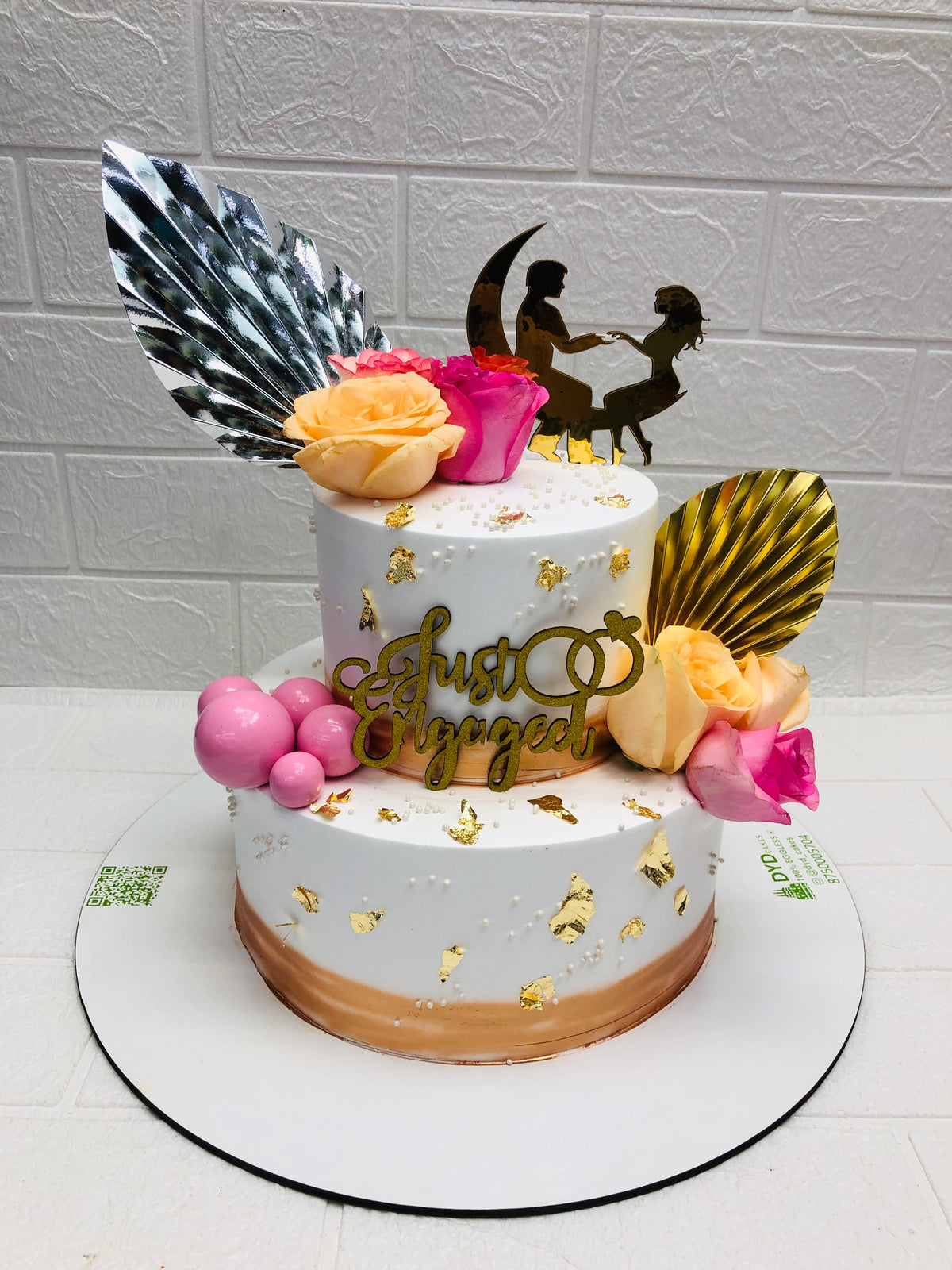Two-Tier White with Gold Leaf cake