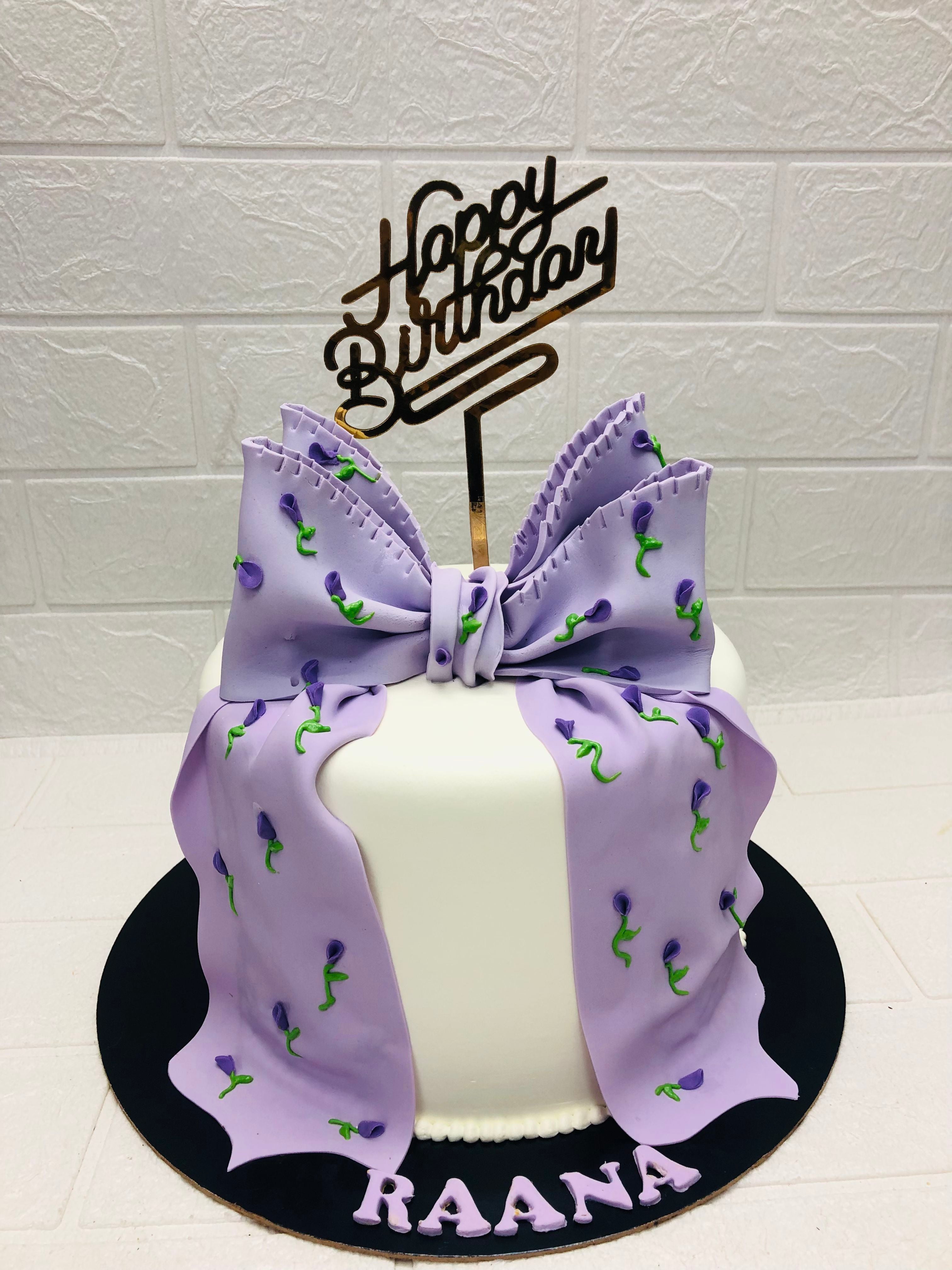 White Fondant with Purple Bow cake