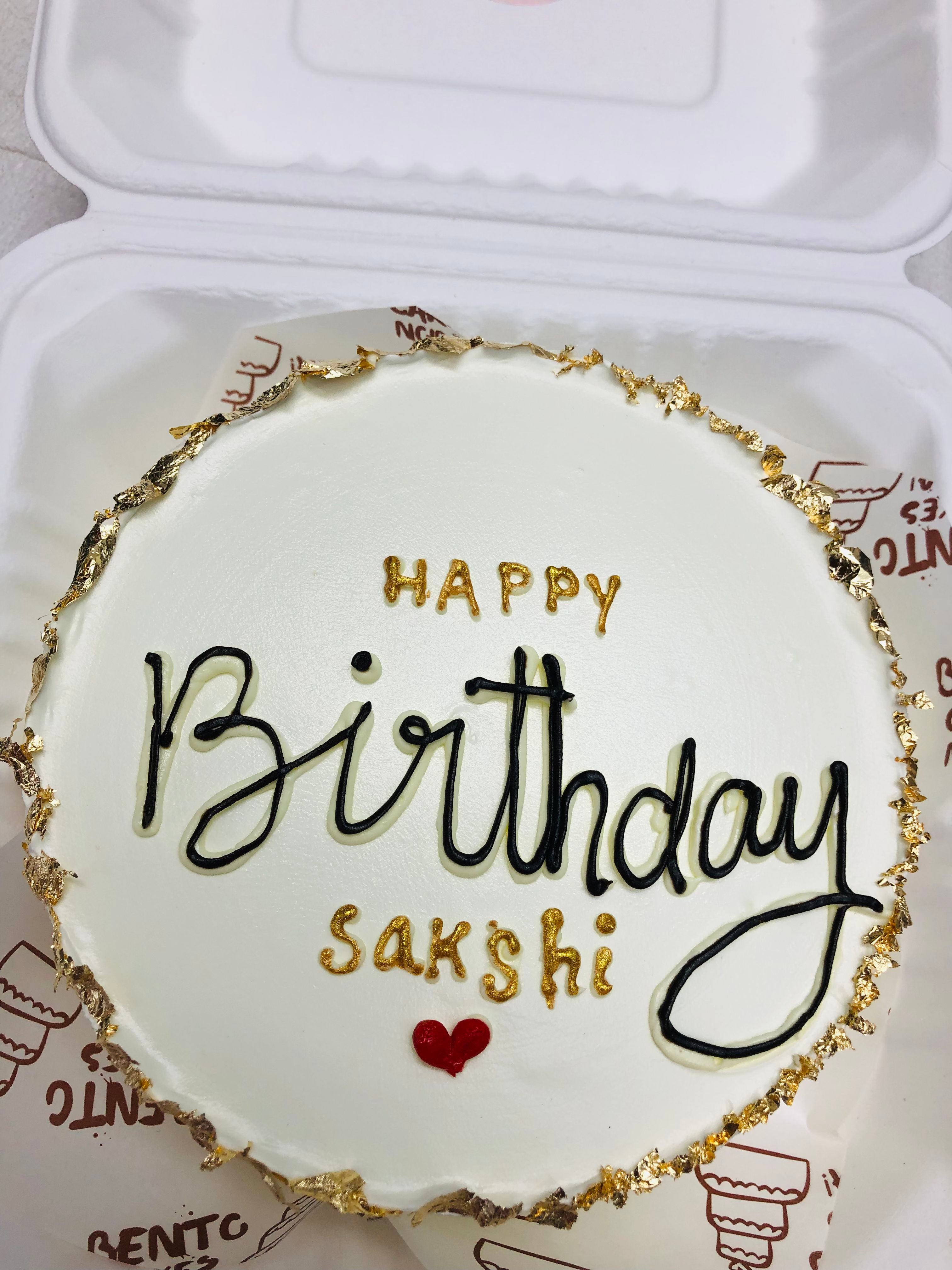 aesthetic White with Gold & Black cake