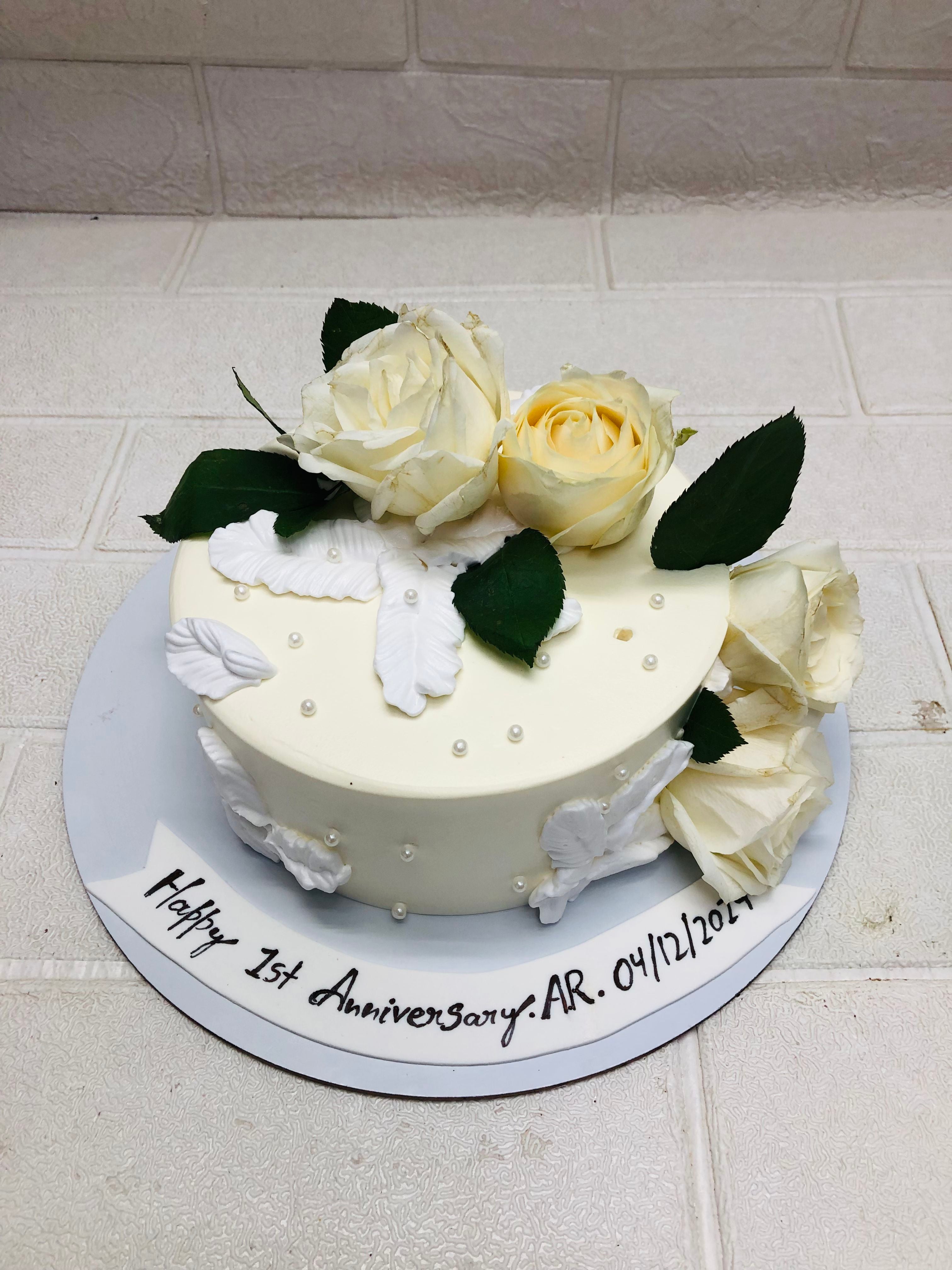 Elegant White Anniversary Cake