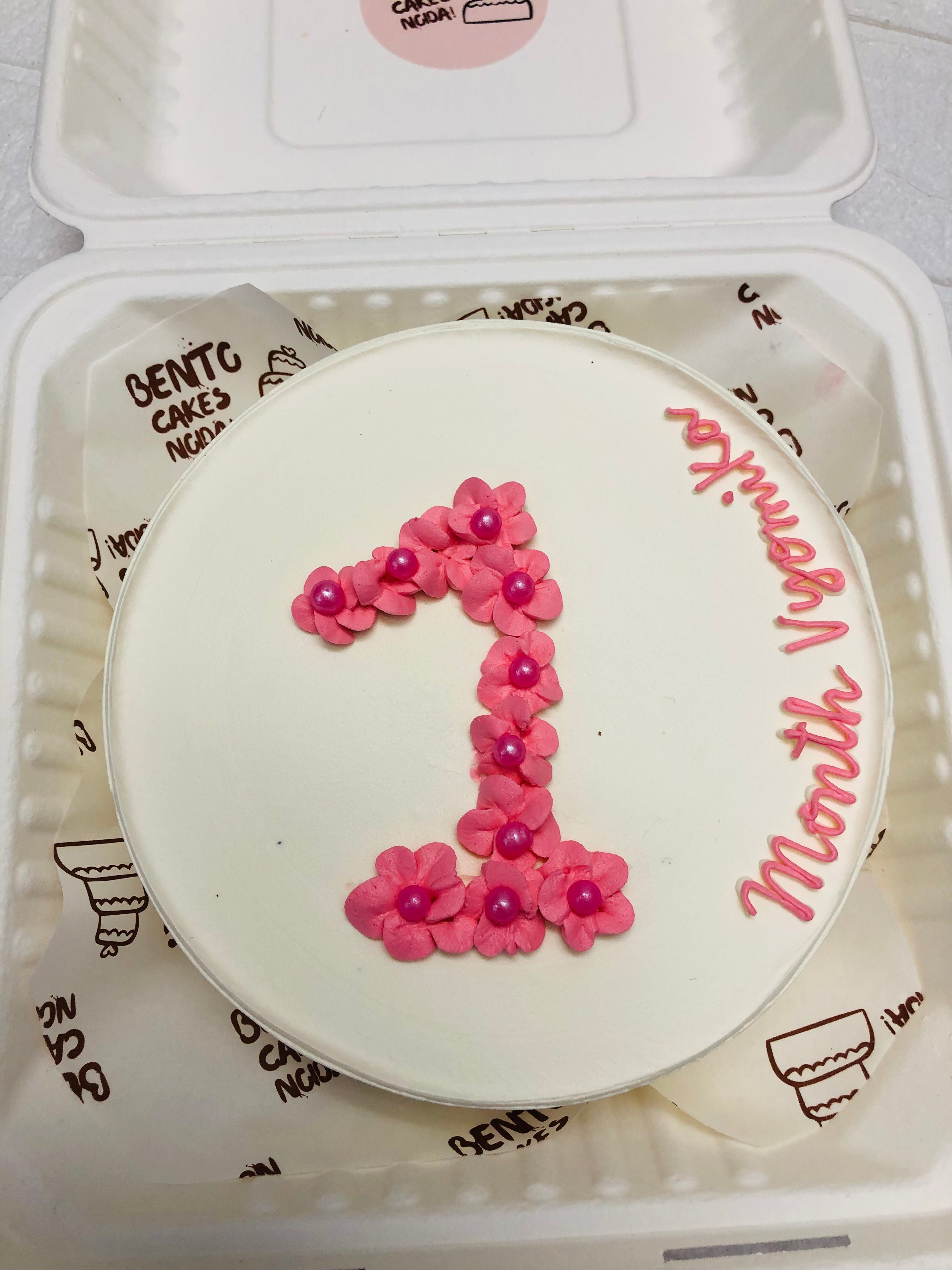 White with Floral pink 1 month cake