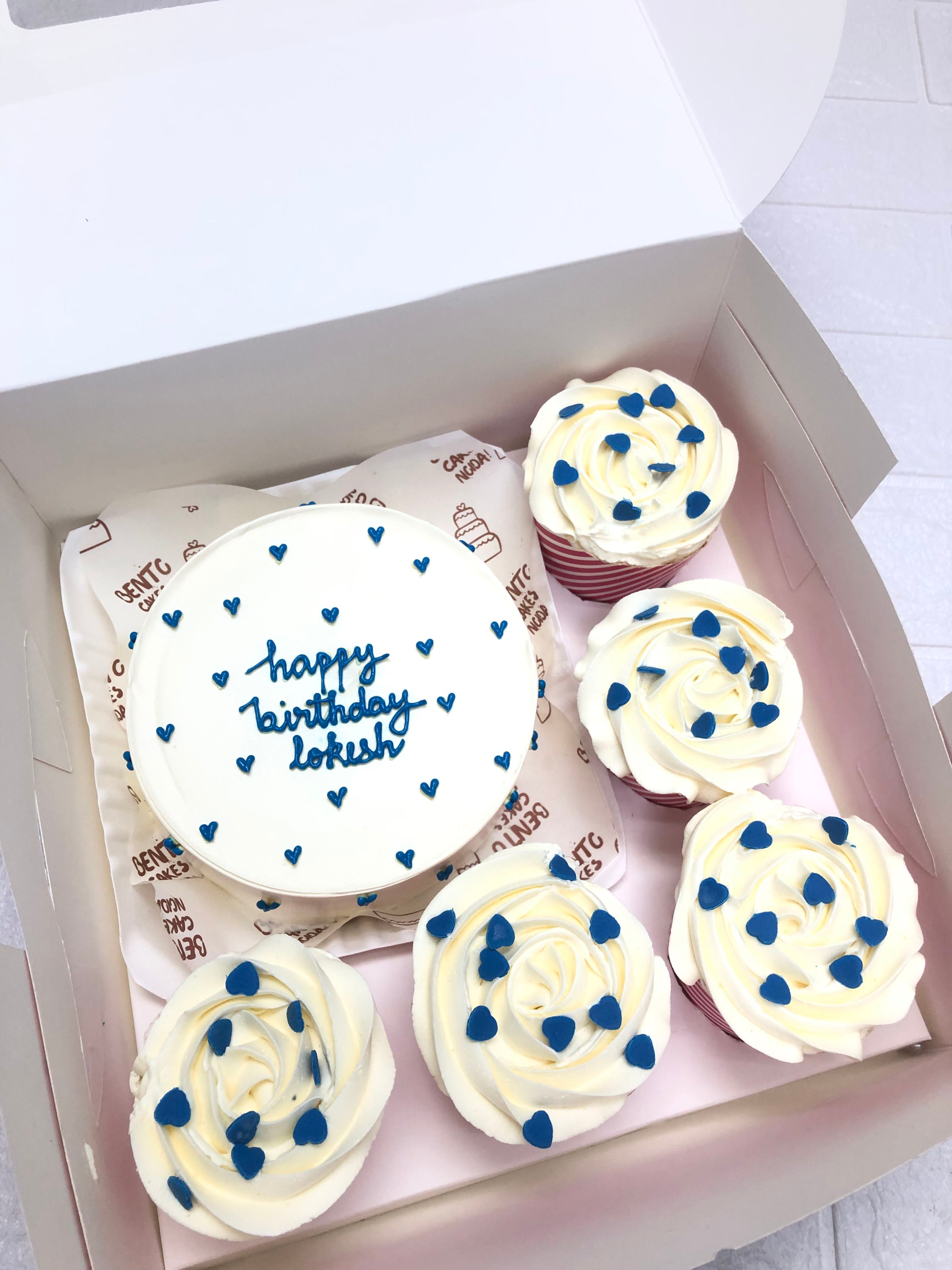 White Frosted with Blue Hearts Cake
